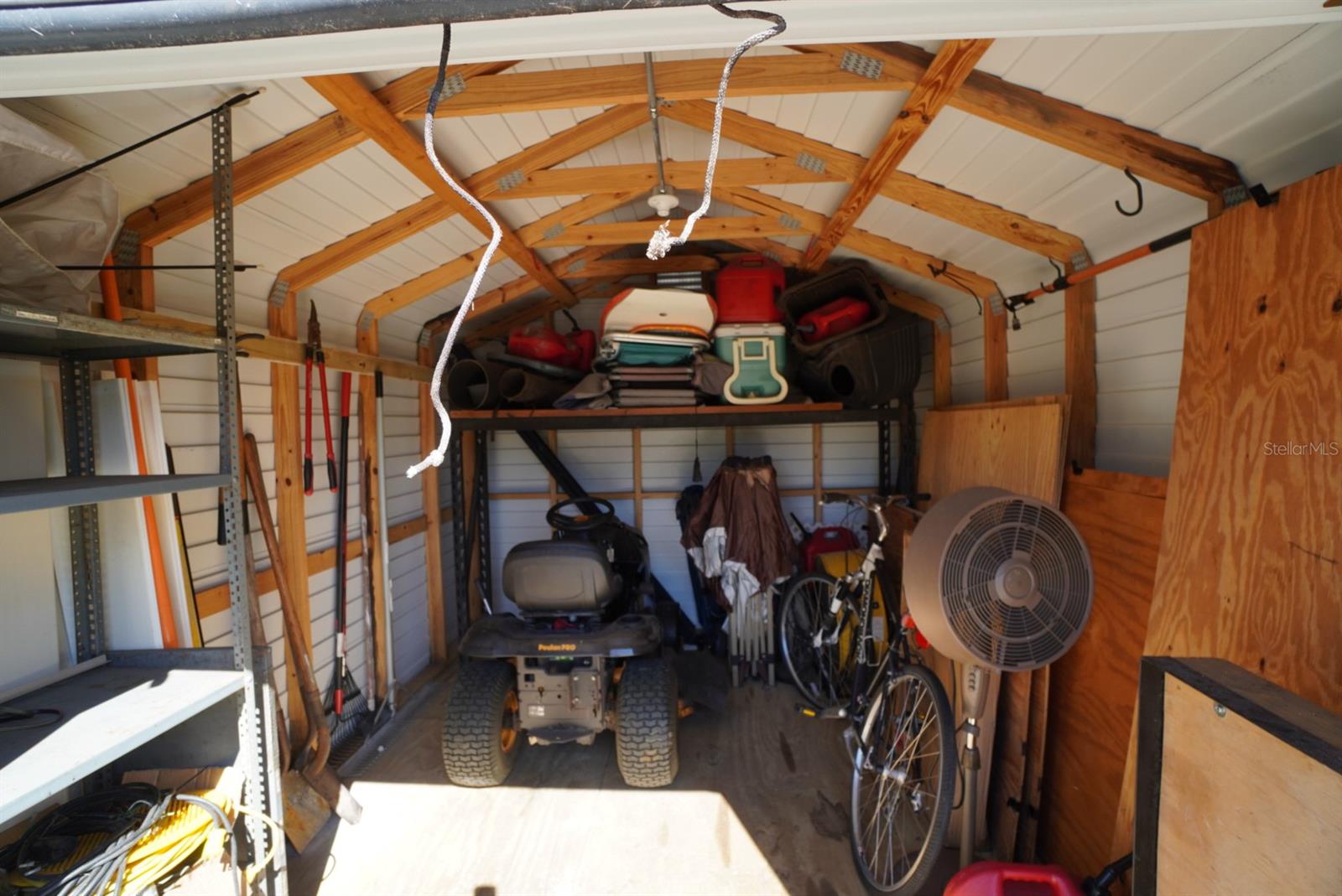 Lawn mower shed