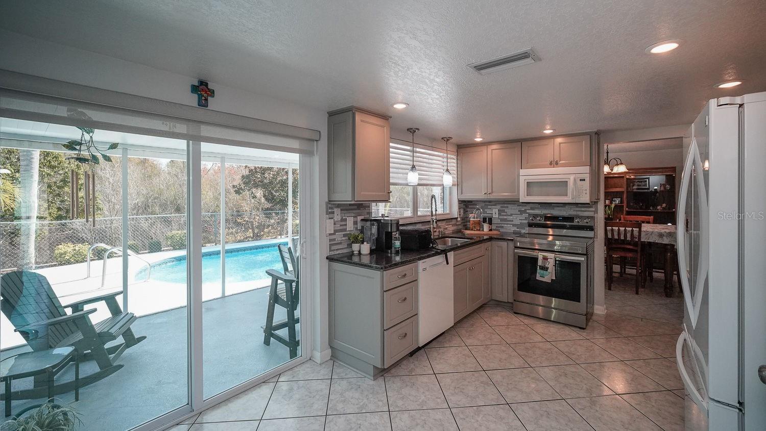 Kitchen, Sliding doors to pool