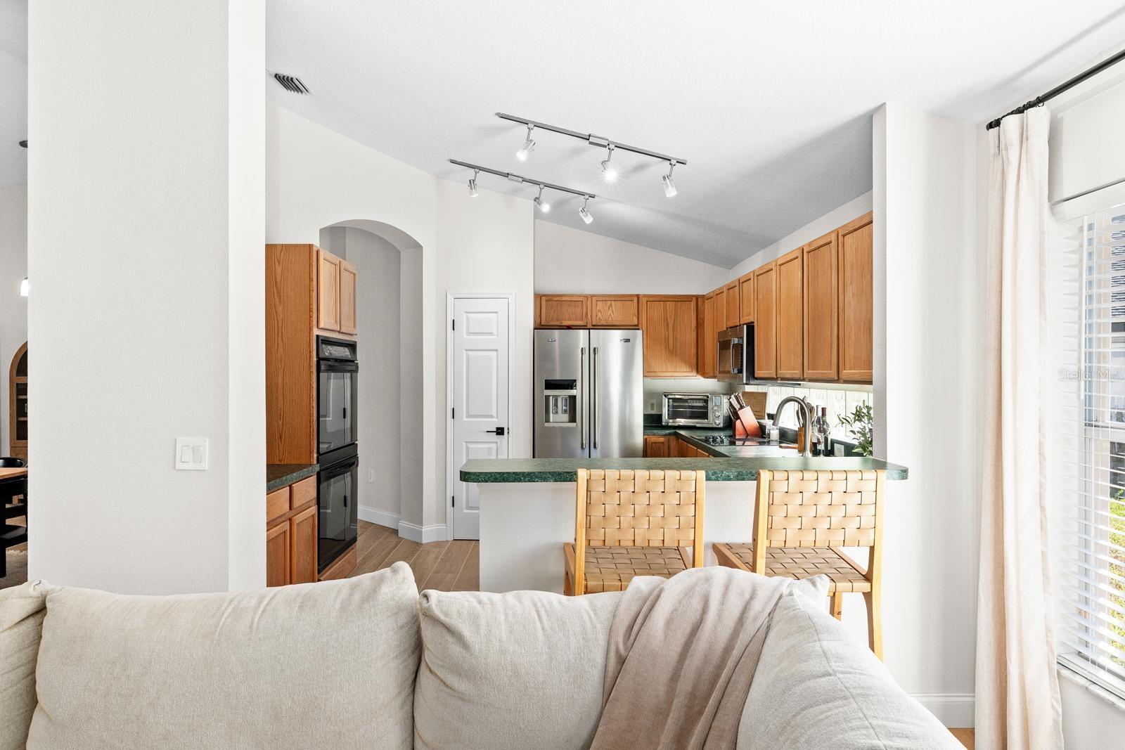 The kitchen is open to the living room so the chef may be part of the fun!