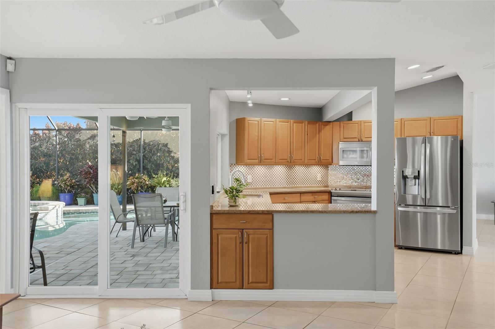 Family Room to Kitchen and pool patio access