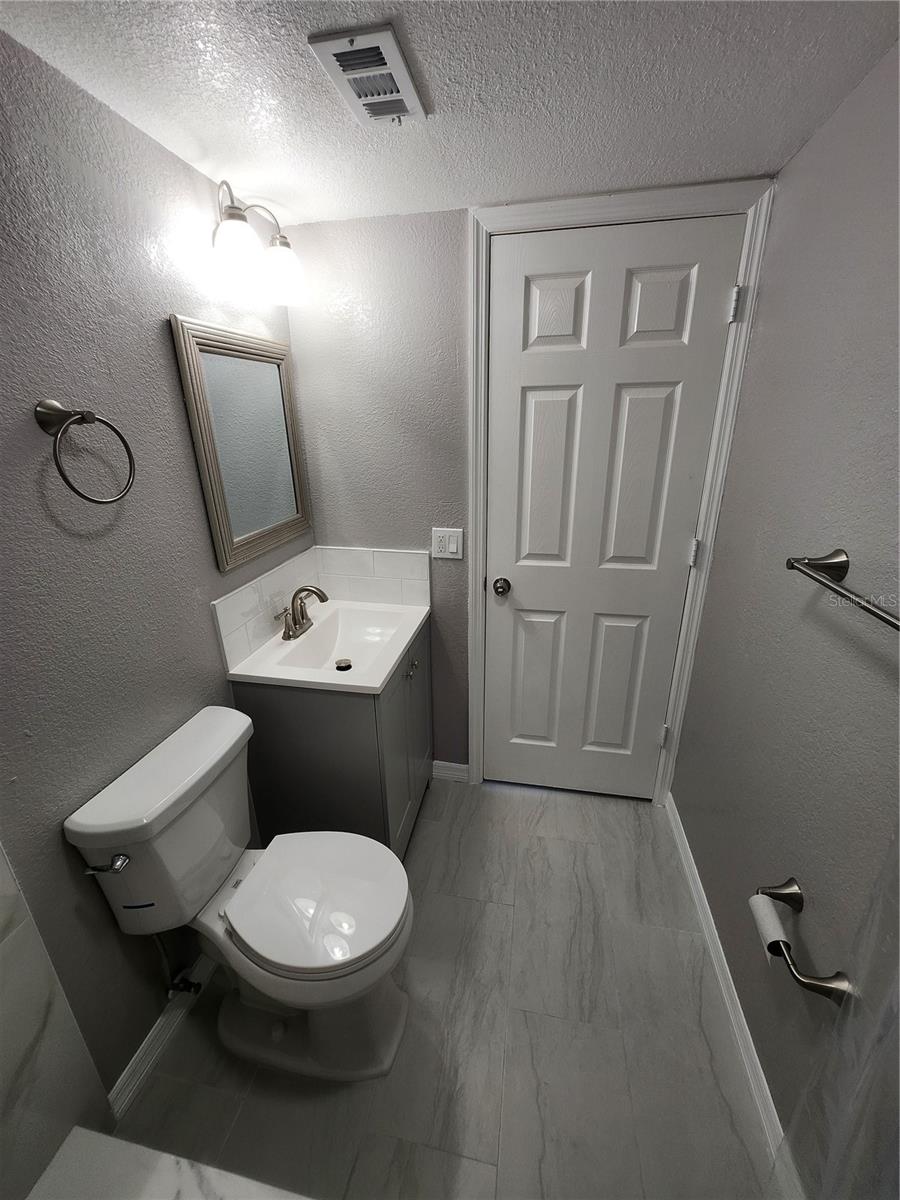 Primary ensuite bathroom has a walkin shower