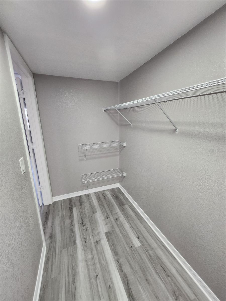 Large walk in closet from other view