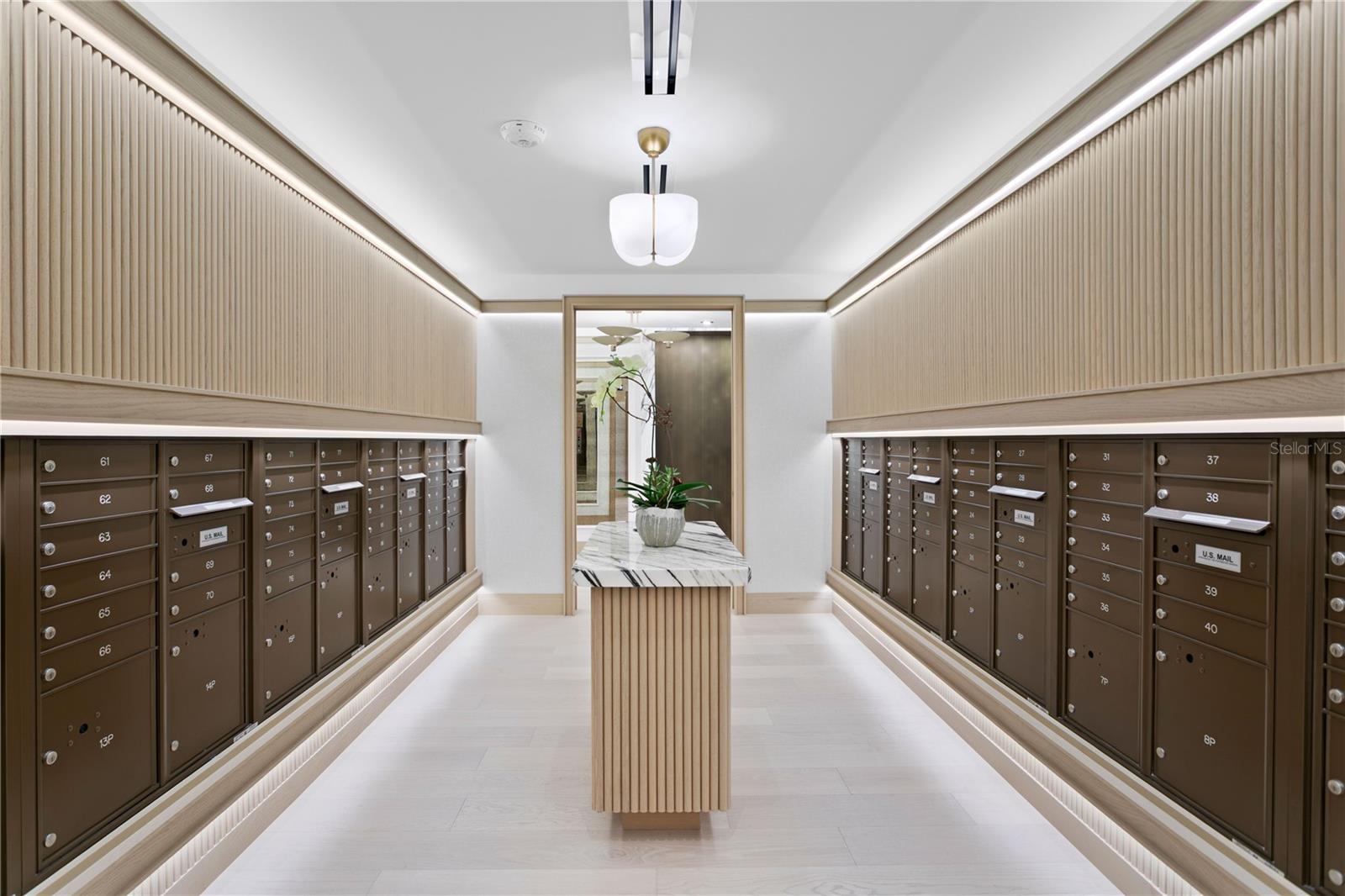 Secure and attended resident mailroom featuring climate-controlled package and parcel storage