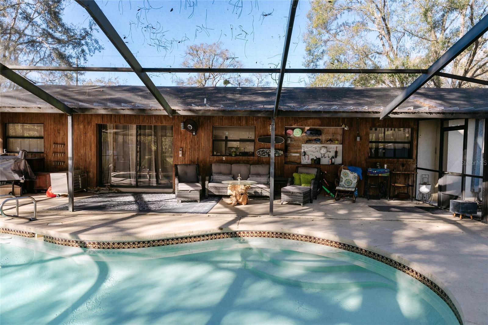 Pool Facing the Home Exterior from the Back