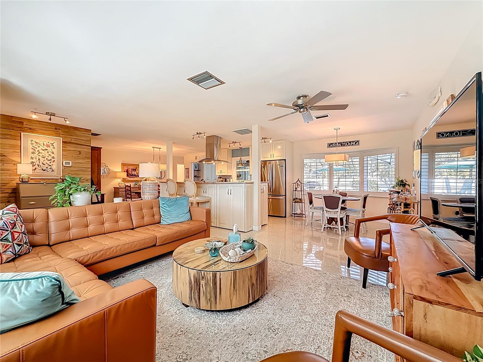The open floor plan allows natural light from both sides of the home.