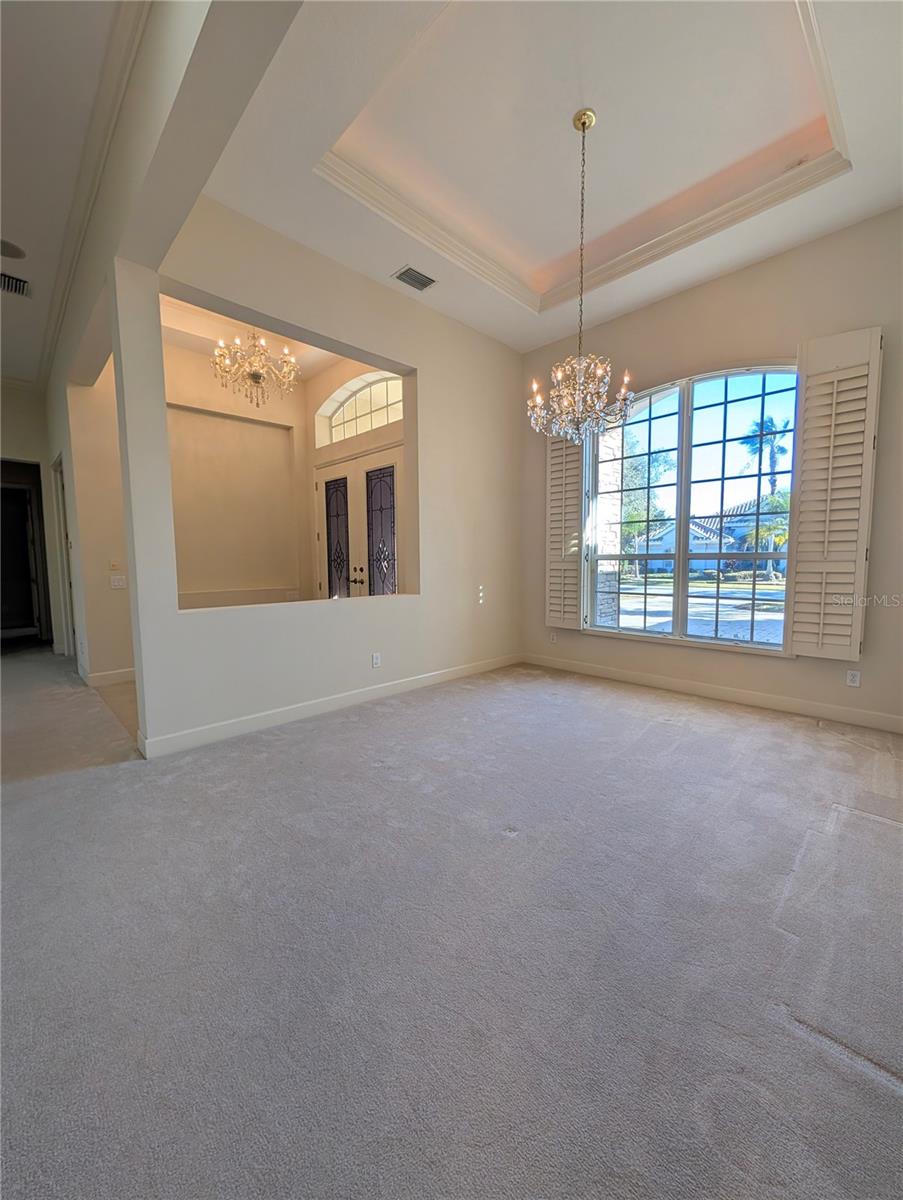 Formal Dining area and Entrance with beautiful crystal chandeliers