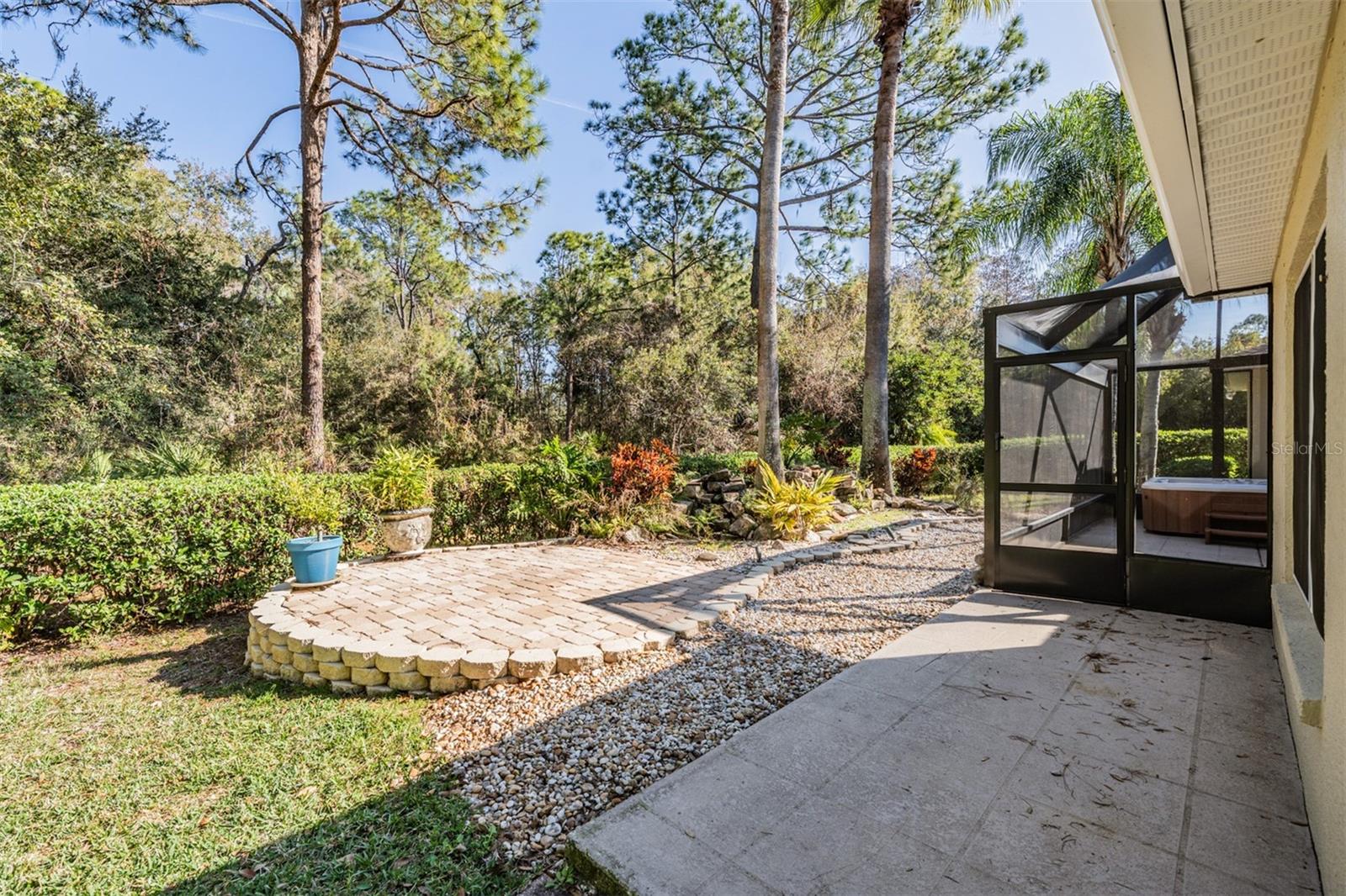 Back open patio and Paver area for firepit or seating area!