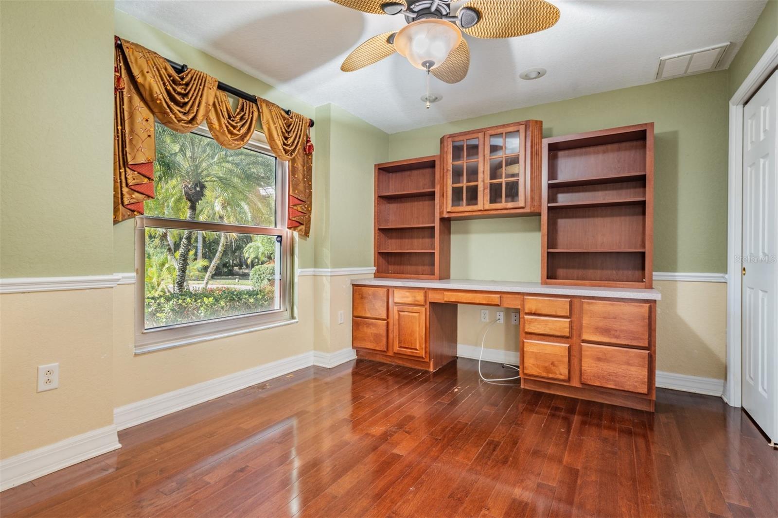 Built ins in OFFice overlooking front lawn and conservation