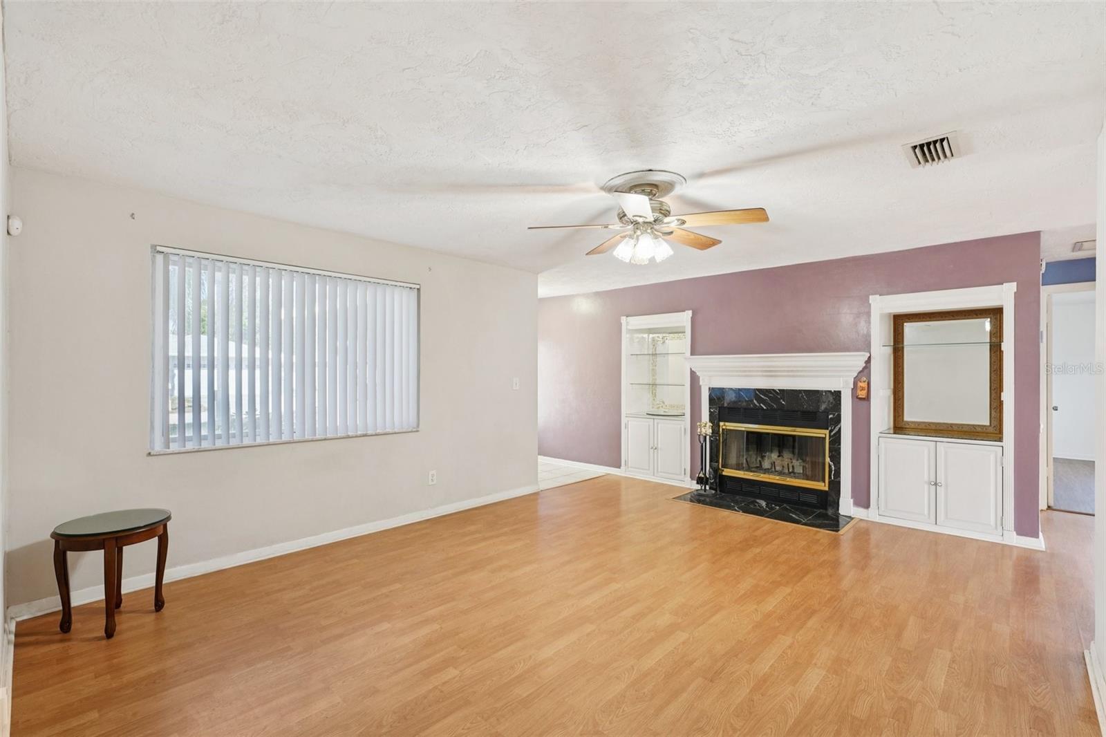 Living Room with wood-burning fireplace