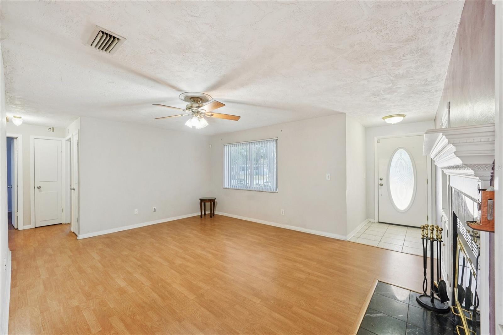 Living Room with wood-burning fireplace