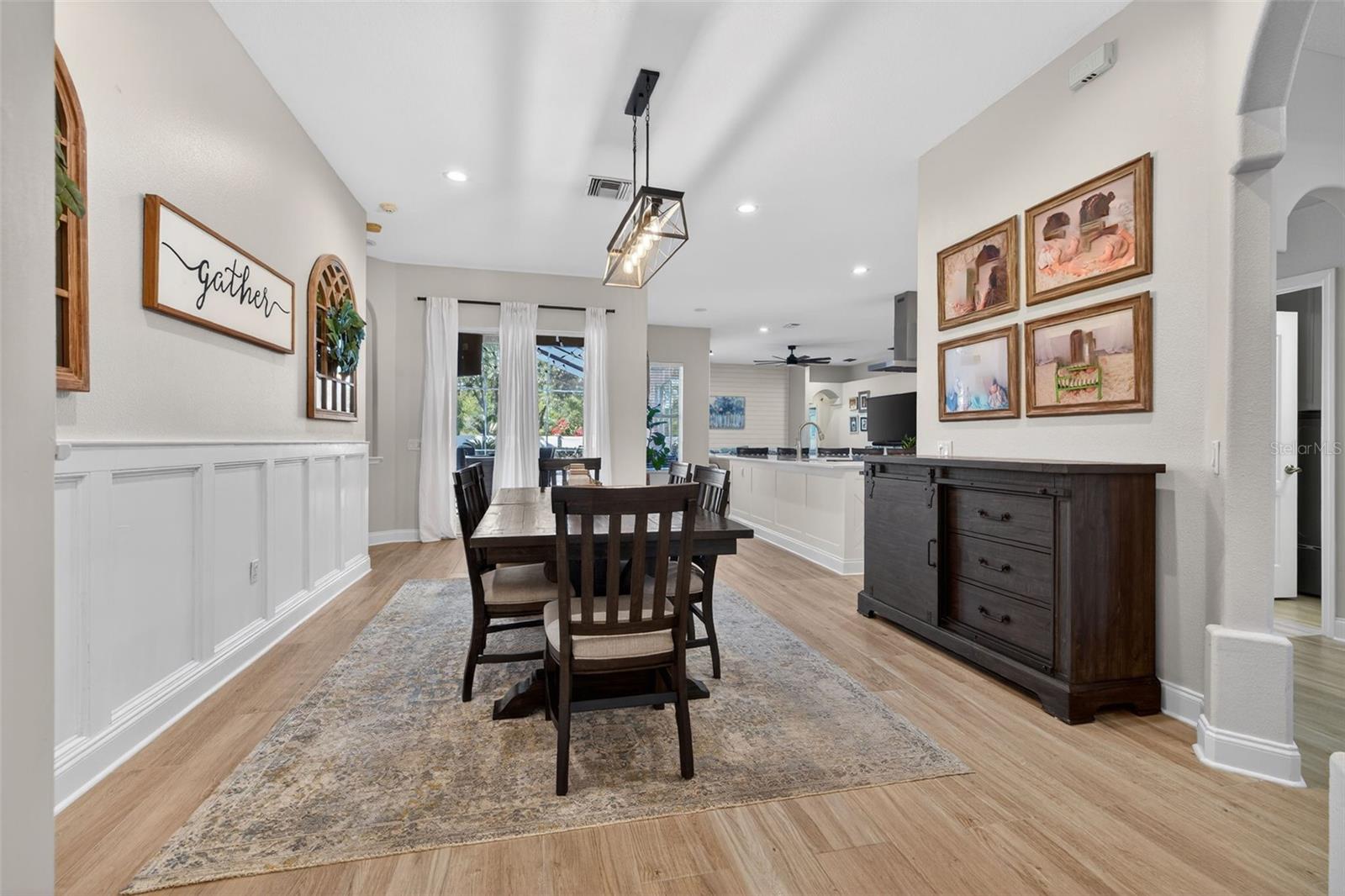 Huge Dining Open Dining Space with custom wainscotting