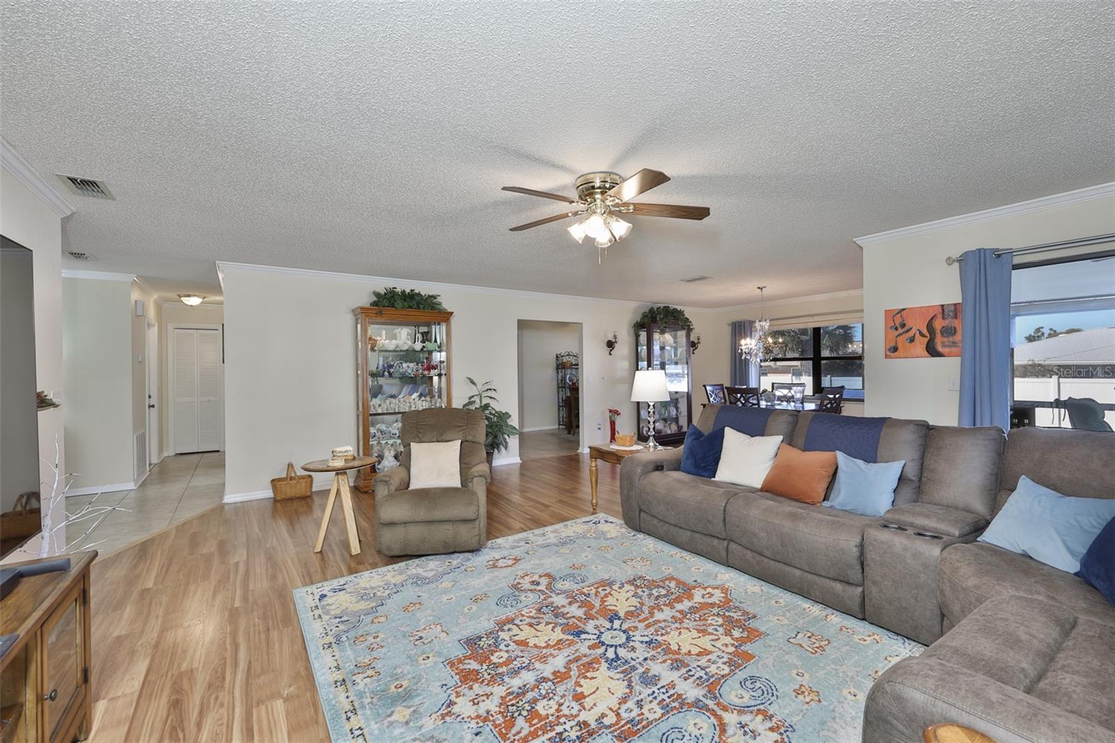 Notice the large living space and beautiful flooring.