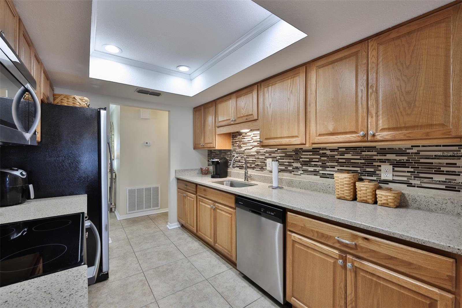 Notice the crown molding in the trey ceiling.