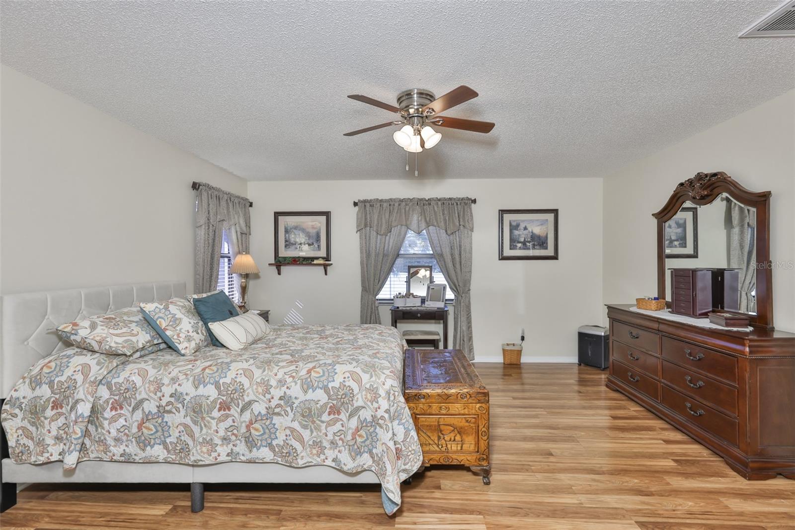 Clean and spacious, with beautiful floors and multiple windows, make this a relaxing and tranquil master suite.