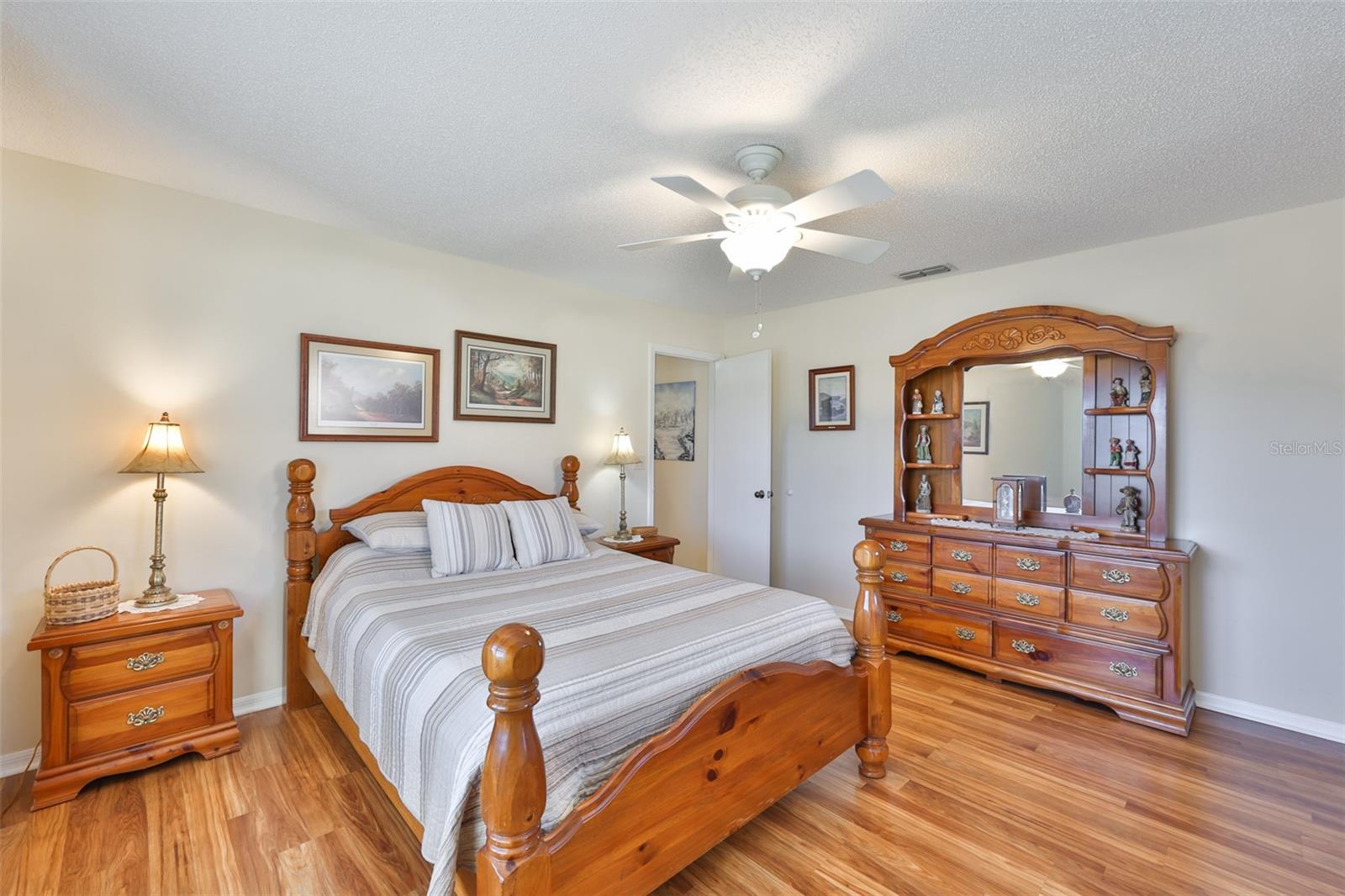 Modern paint tones, clean floors and space make this a perfect quest room.