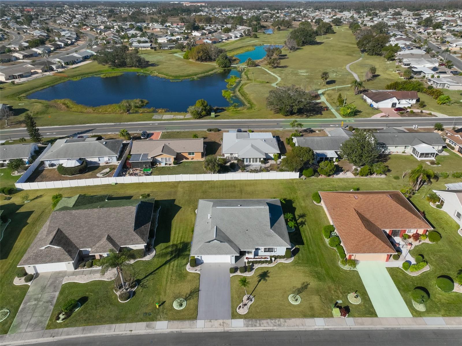 Aerial view of home and neighborhood.