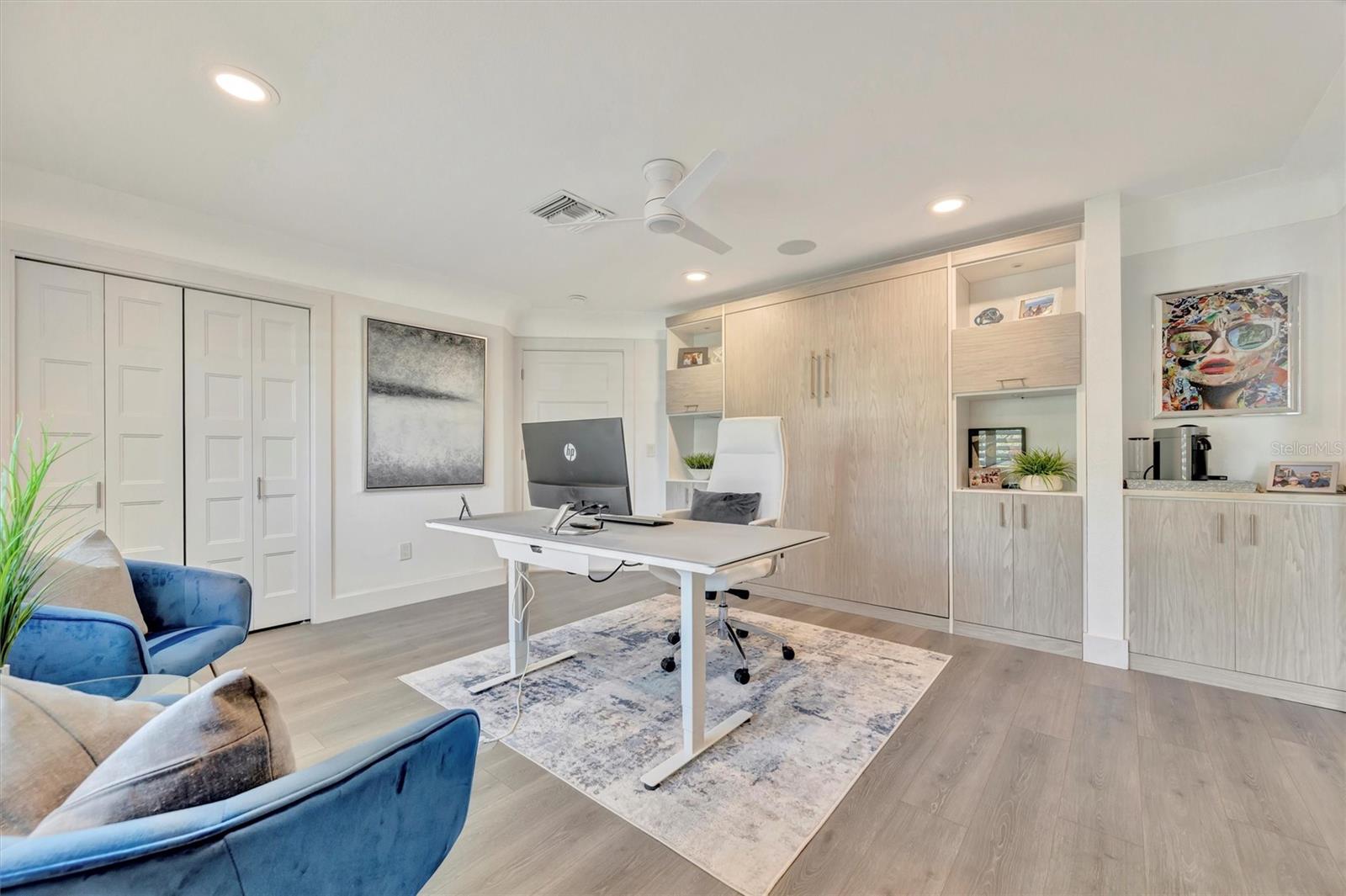 2nd Bedroom, Custom-built-in Murphy bed and cabinets.