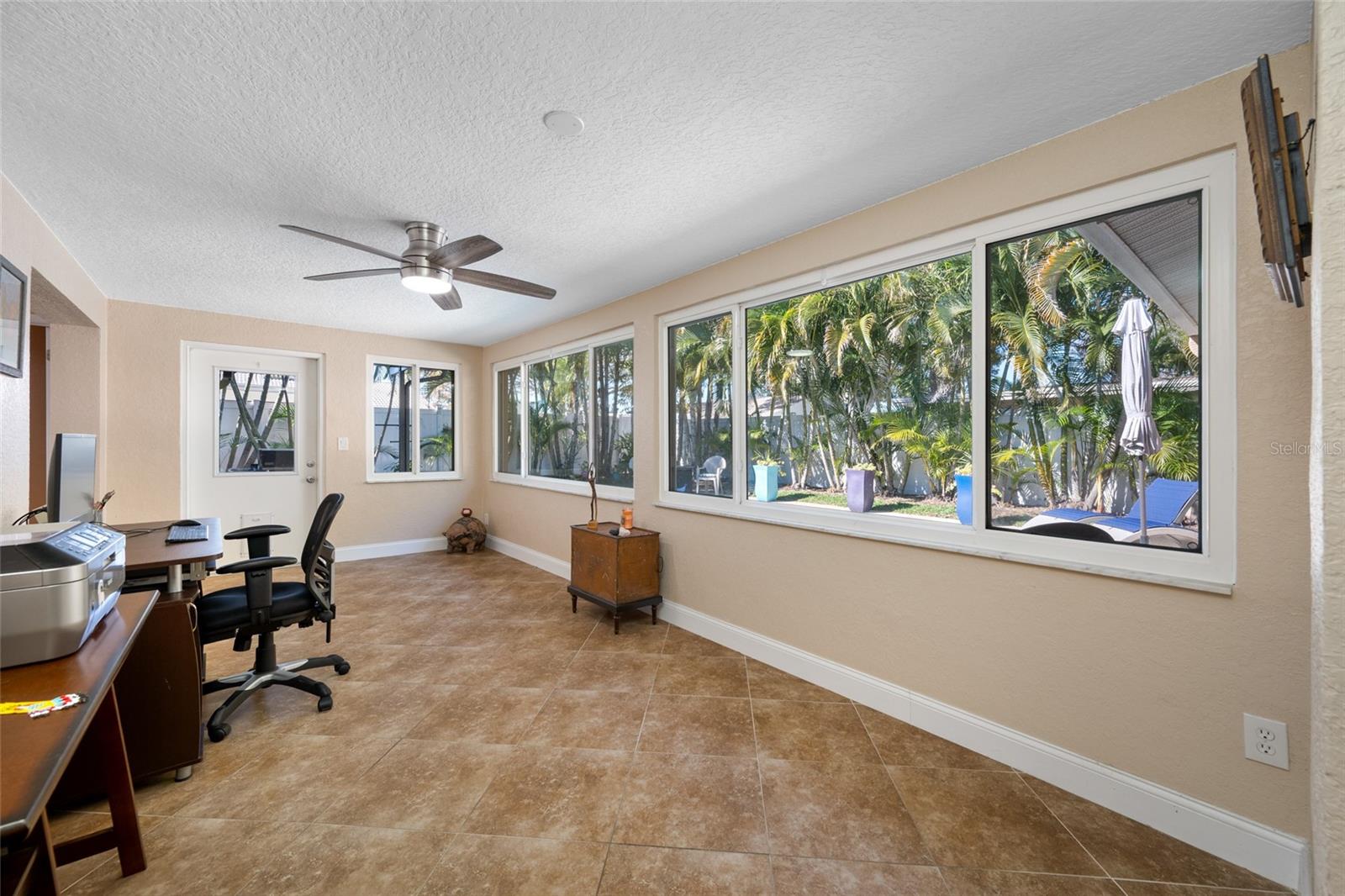 Bonus Room  used as an office with view of pool area