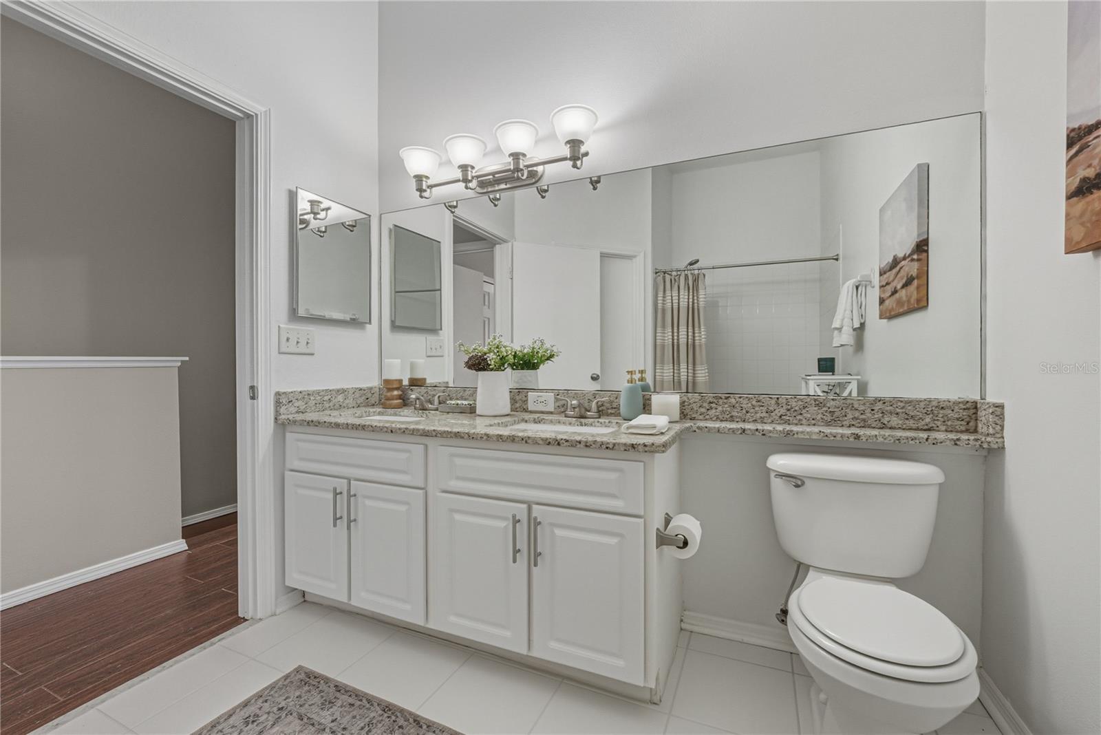 Primary Upstairs Bath with Dual Sinks and Granite Countertops