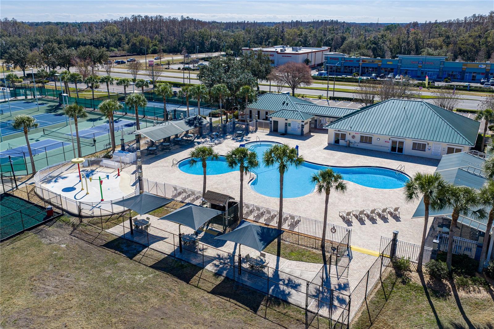 Community Pool & Waterpark with Covered Outdoor Seating and Louning Space