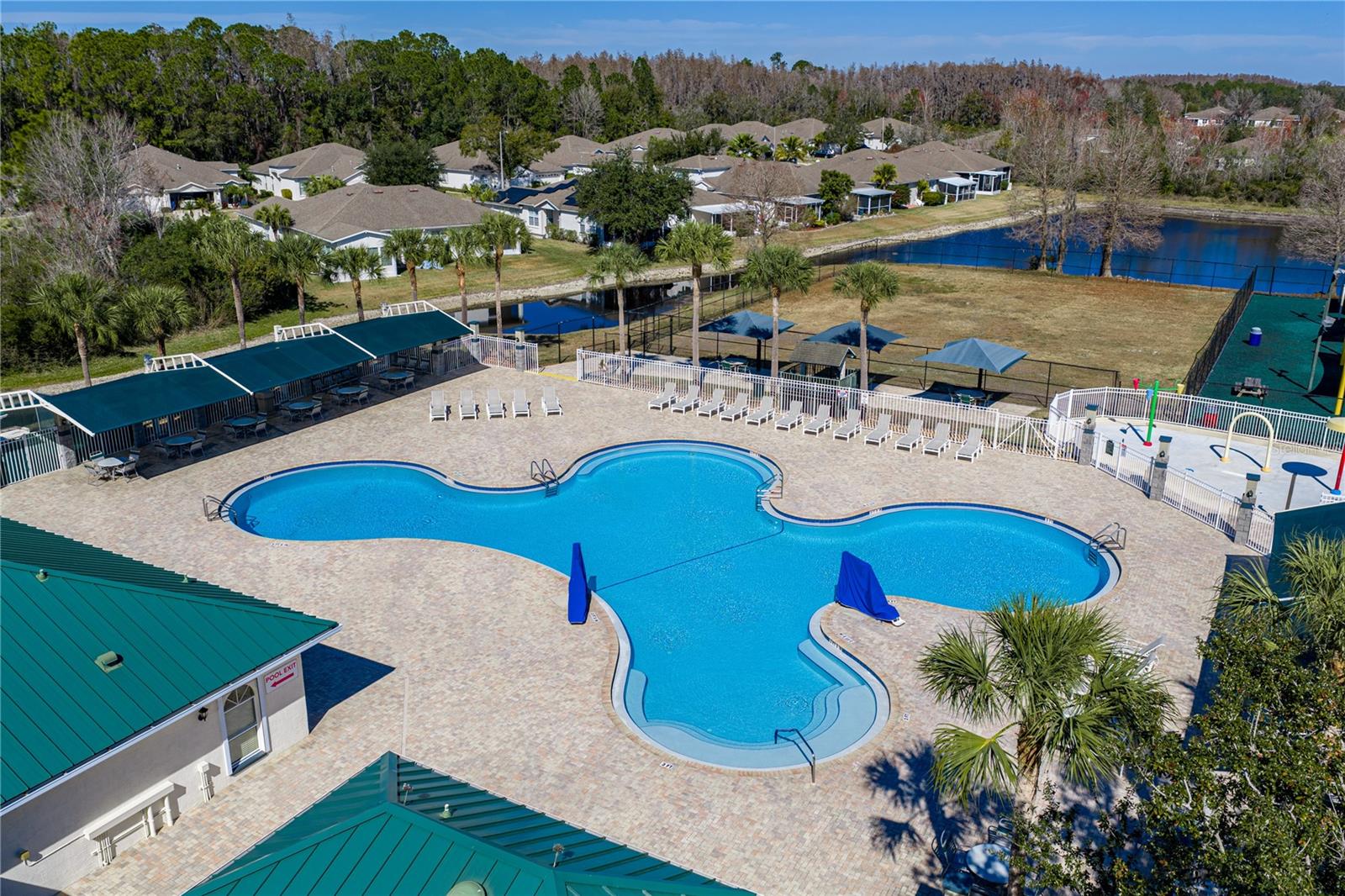 Community Pool & Waterpark with Covered Outdoor Seating and Louning Space