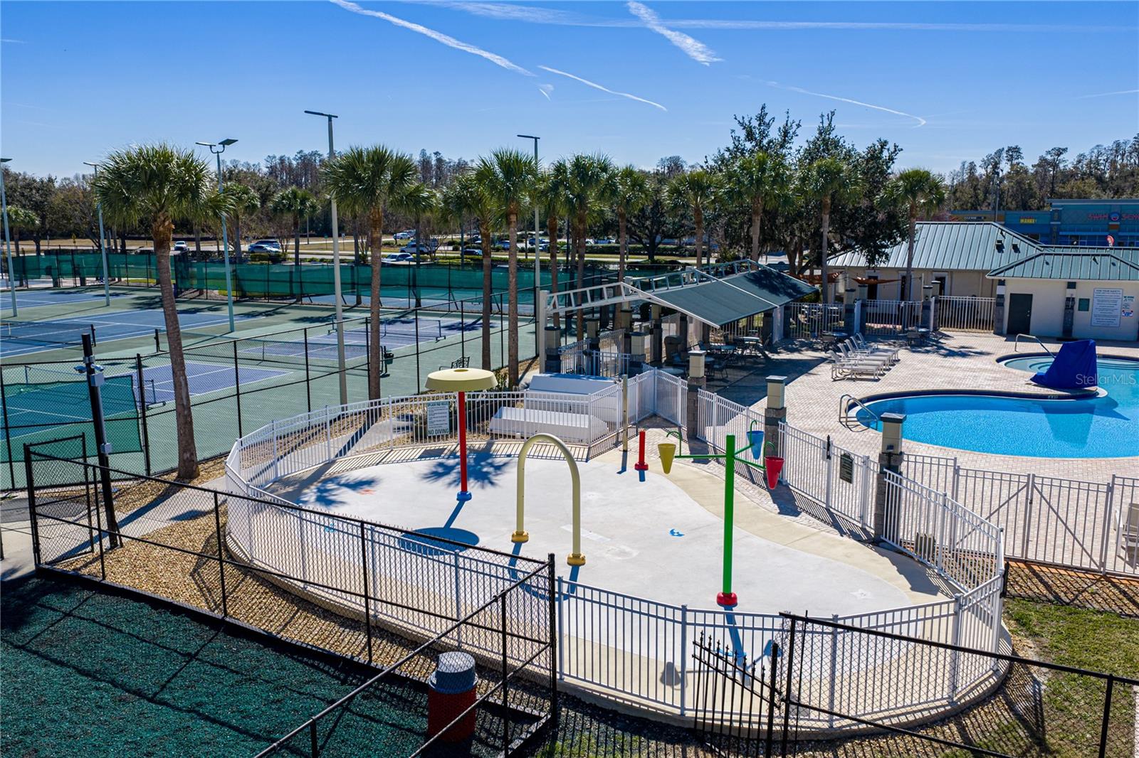 Community Pool & Waterpark with Covered Outdoor Seating and Louning Space