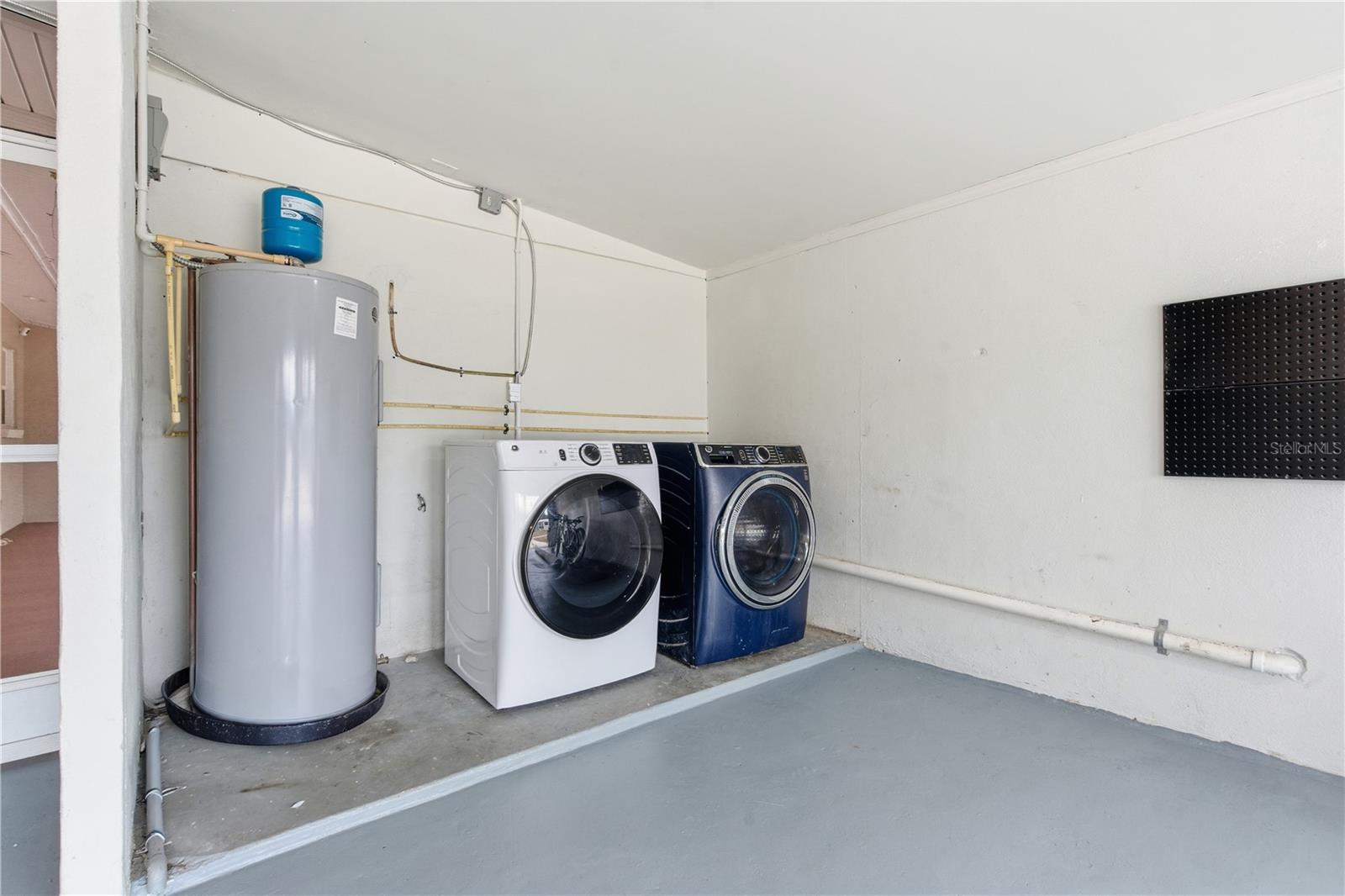 Laundry in Garage **There is a laundry closet in the home and the laundry could be moved back inside if desired.**