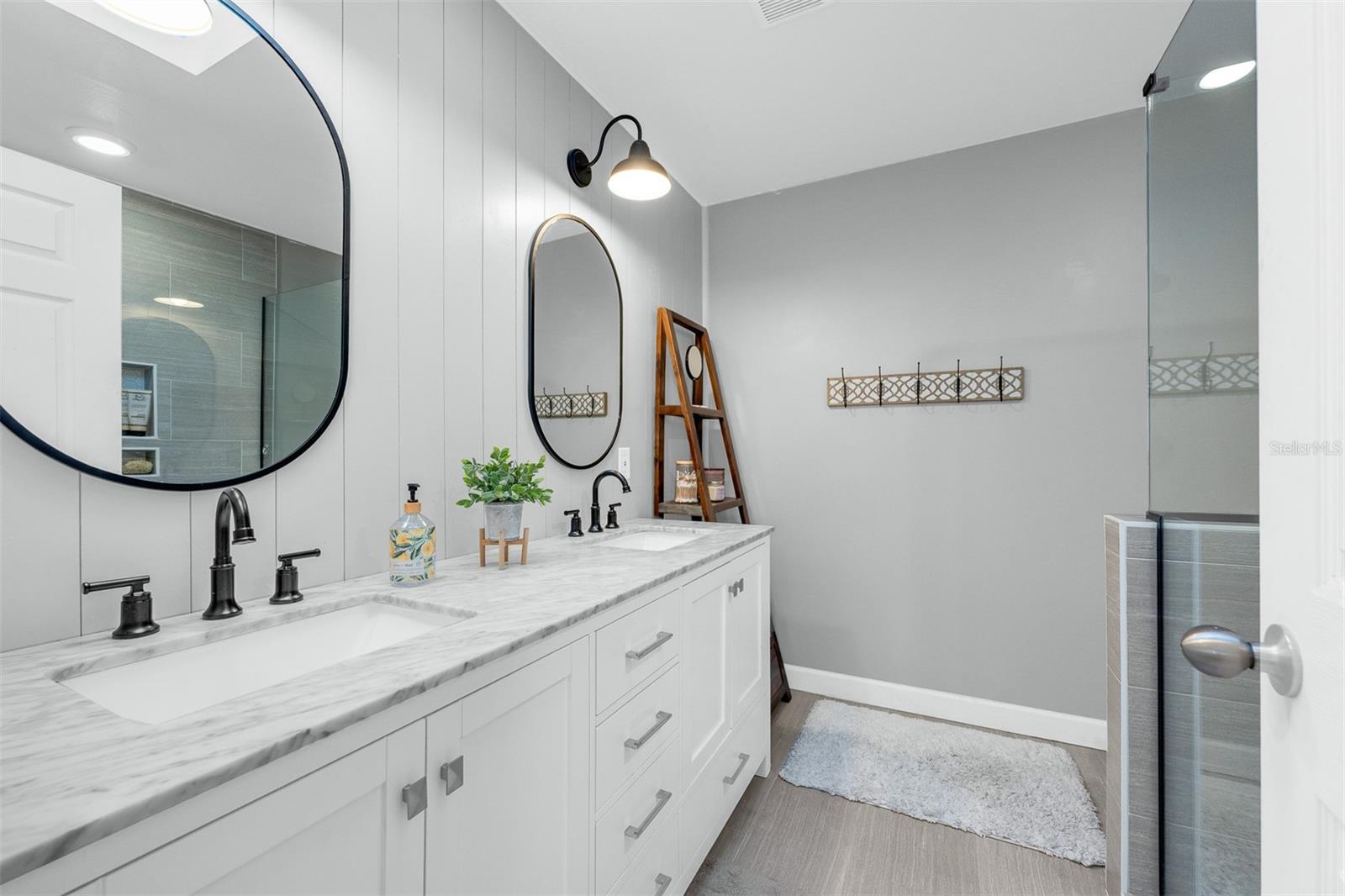 Master bathroom with walk-in shower. Dual sinks.  7'10" X 8/5"