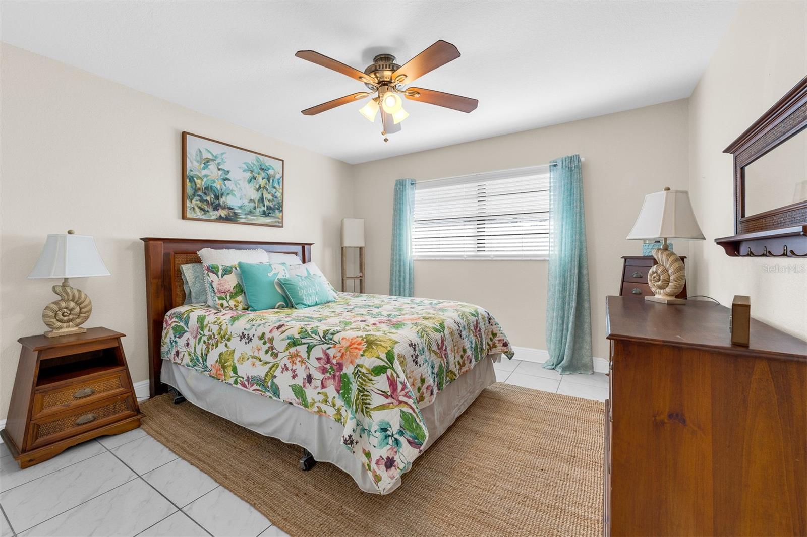 Bedroom #2 / 12'4" X 12'1" .  Lots of natural lighting. Large closet.