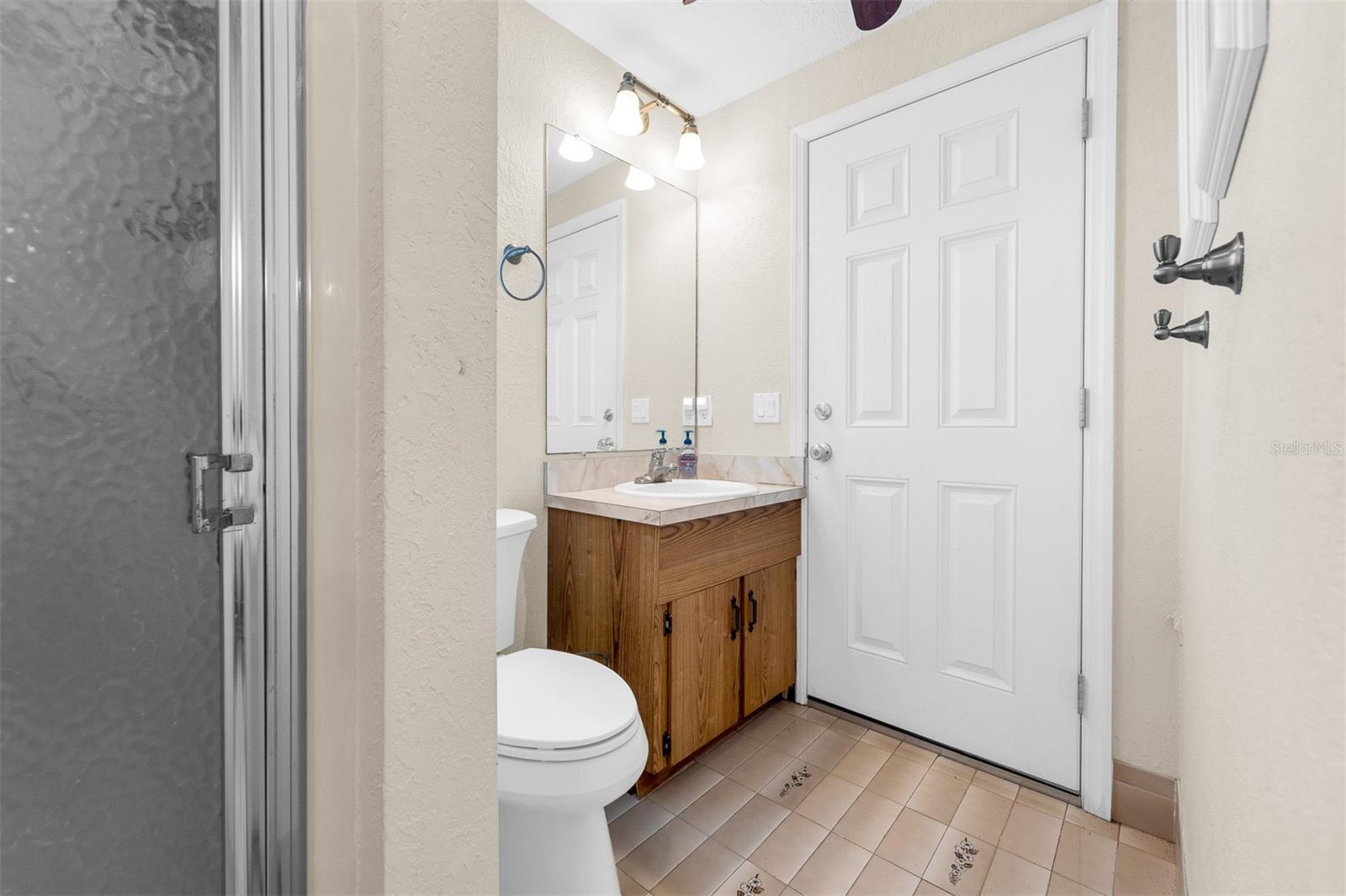 Pool bath. 8'7" X 8'4". goes out to open air pool and pool deck. Bathroom just off bedroom #4.