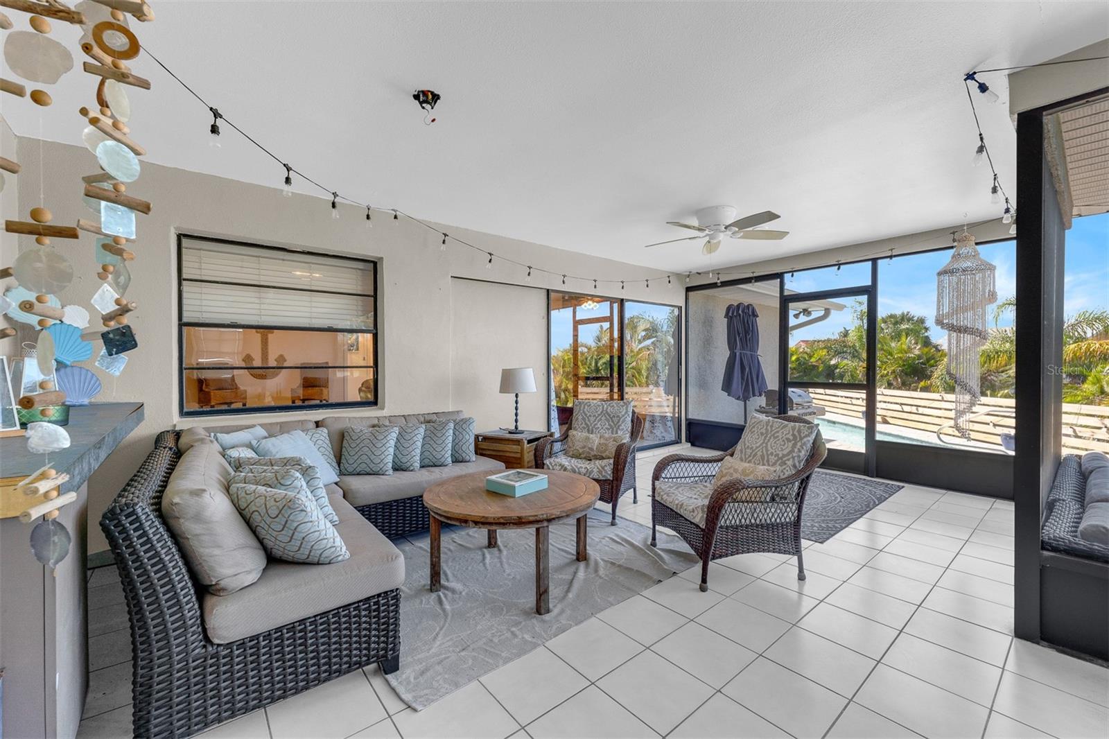 Large screened in lanai with service bar and pass through from the kitchen. Great for entertaining. Lanai measures 28'4" X 21'3"