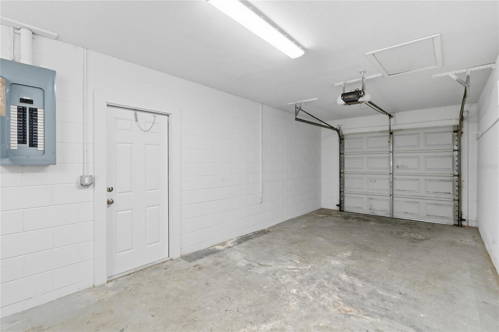 1 car garage with updated/labeled Electric Panel and Garage Door Opener and washer/dryer (next picture.)