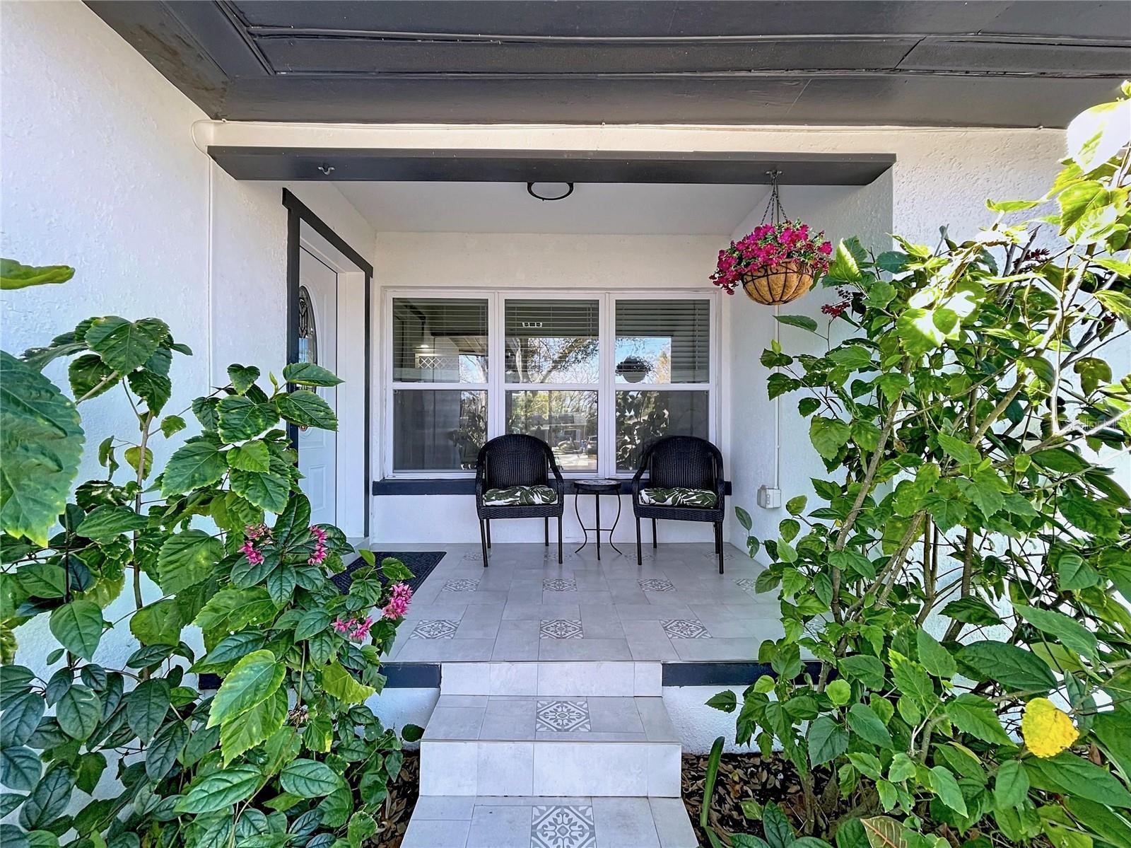 Inviting front porch with enough room for table & chairs