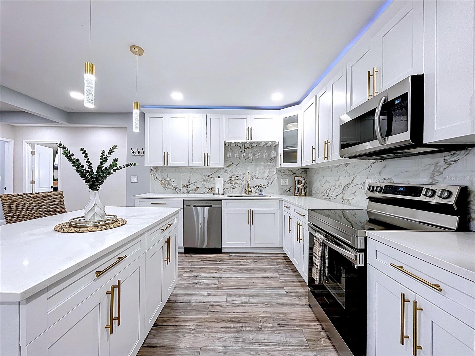 All new stainless steelappliances in kitchen