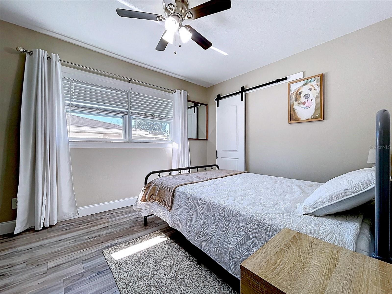 Bedroom 2 has a new barn door to the closet