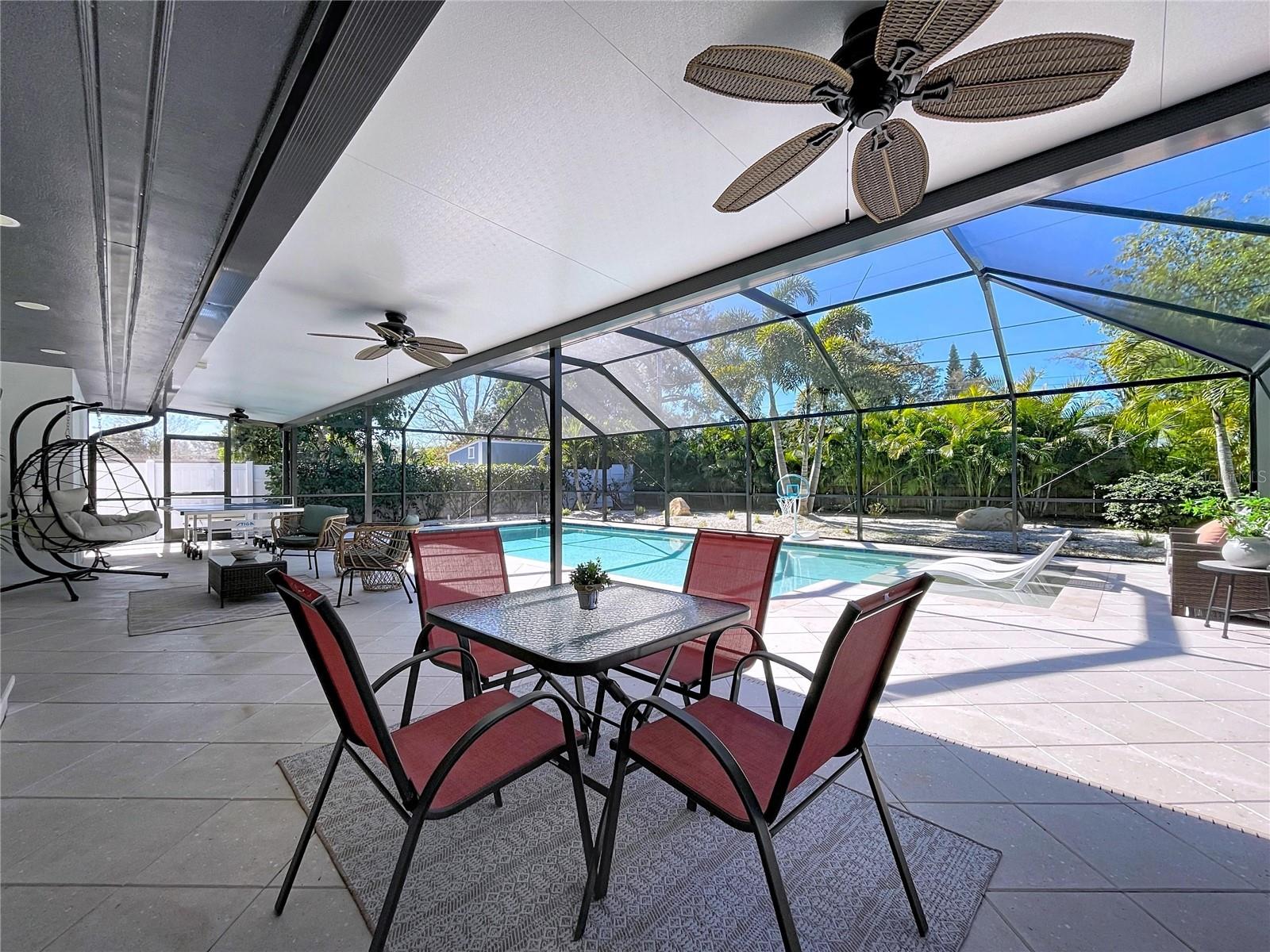 TONS of covered outdoor living space out back