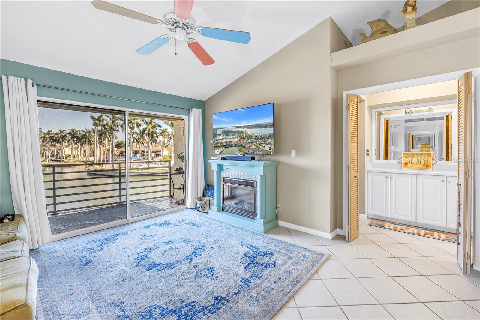 Living Room with sliding doors to balcony and golf course views