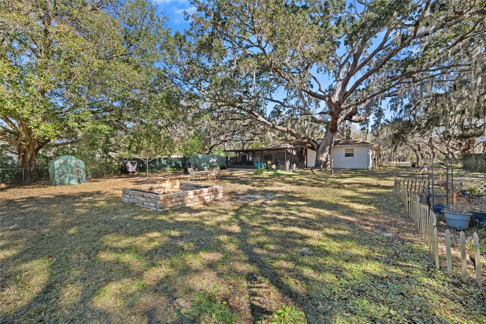 Firepit ~ Garden with Picket Fence ~ Storage Shed