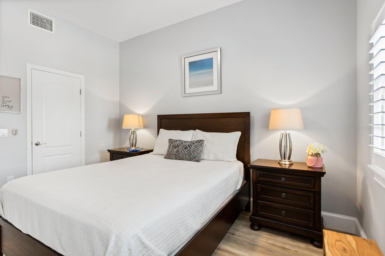 Upstairs leads to two more bedrooms & laundry room