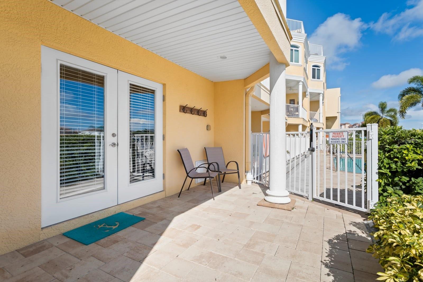 Ground/Garage Level leads to heated pool