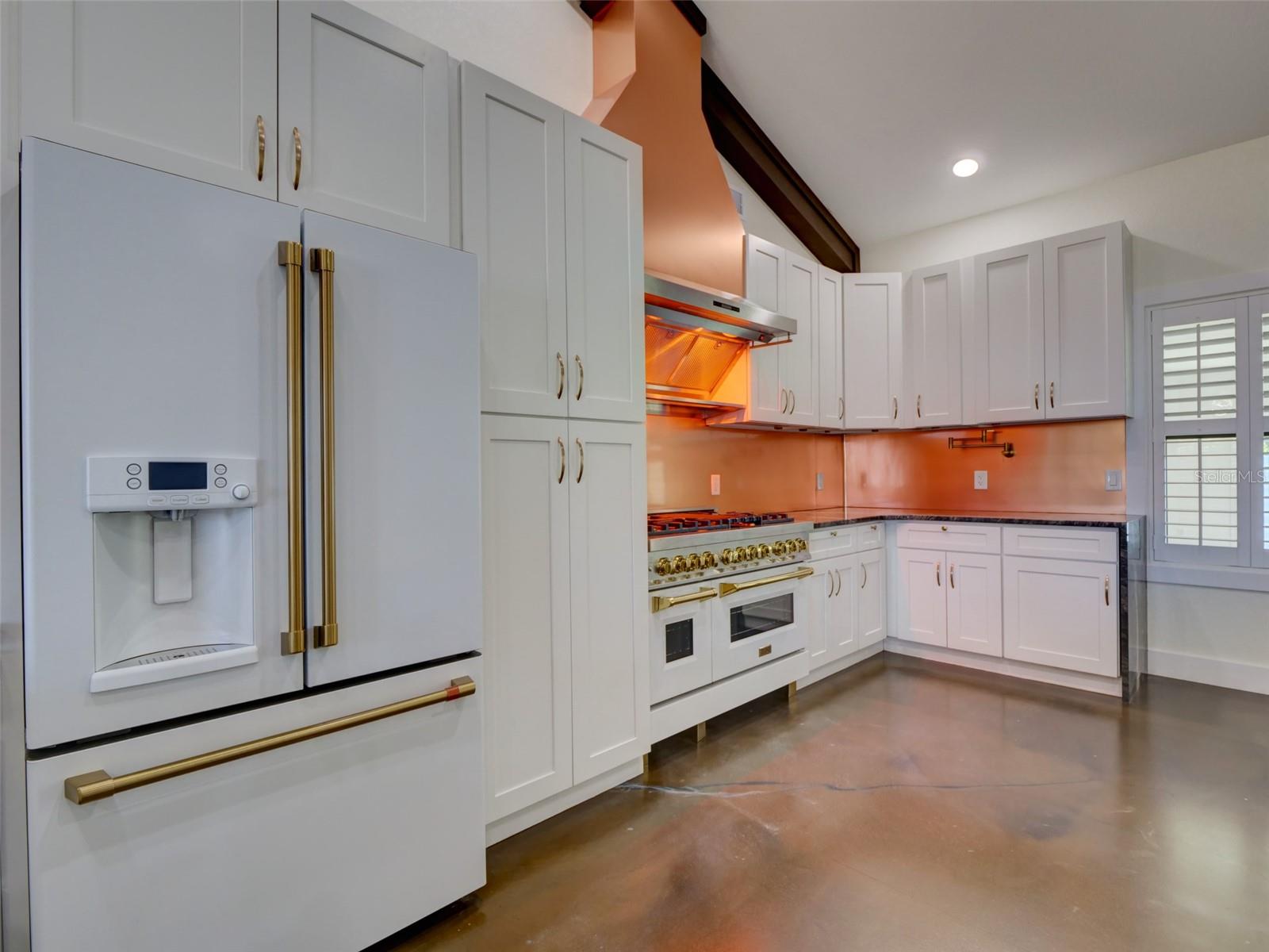 GE Cafe Refrigerator and Kitchen view