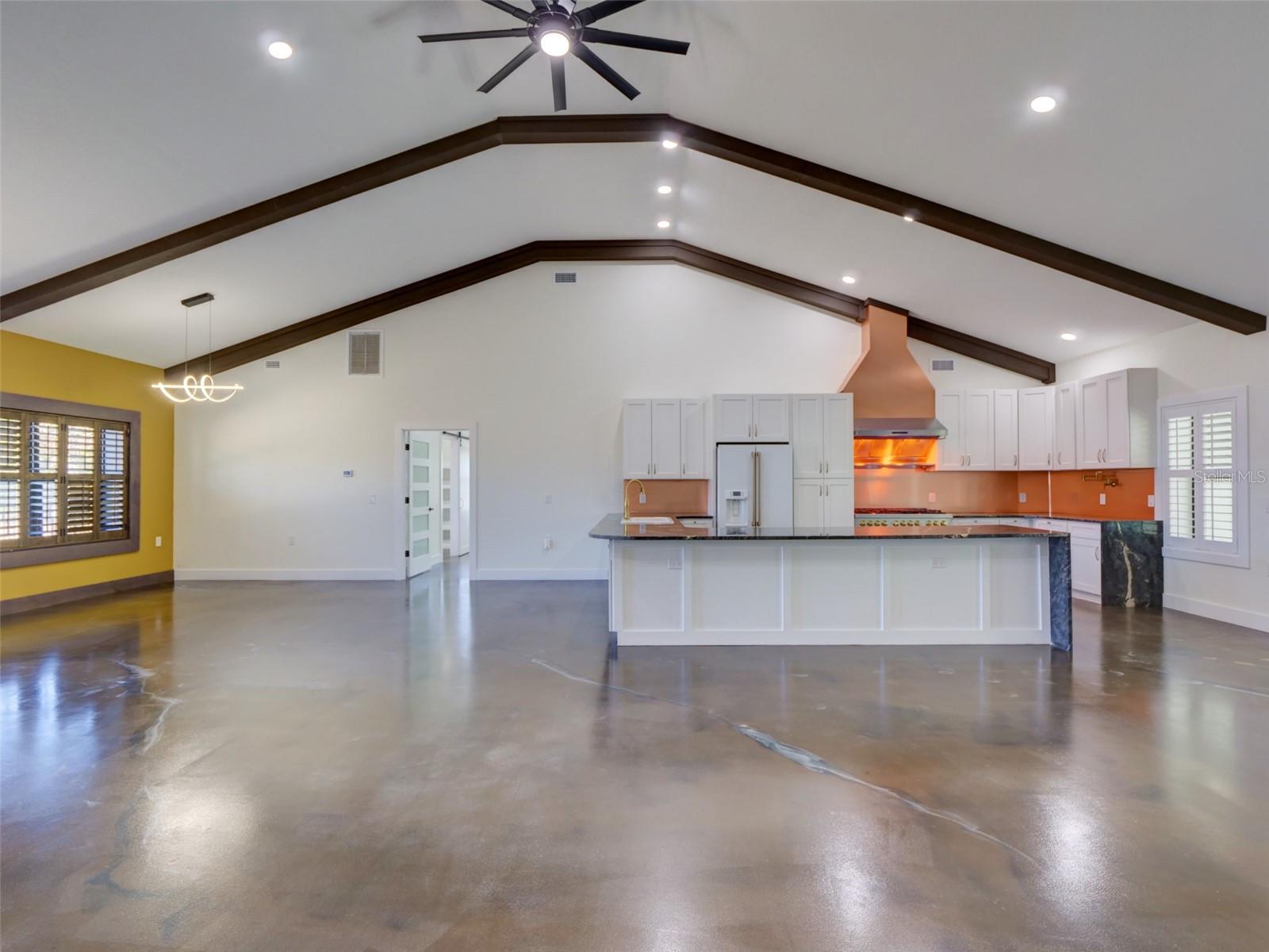 Kitchen, Living Room, Dining Room Entrance to Primary Room