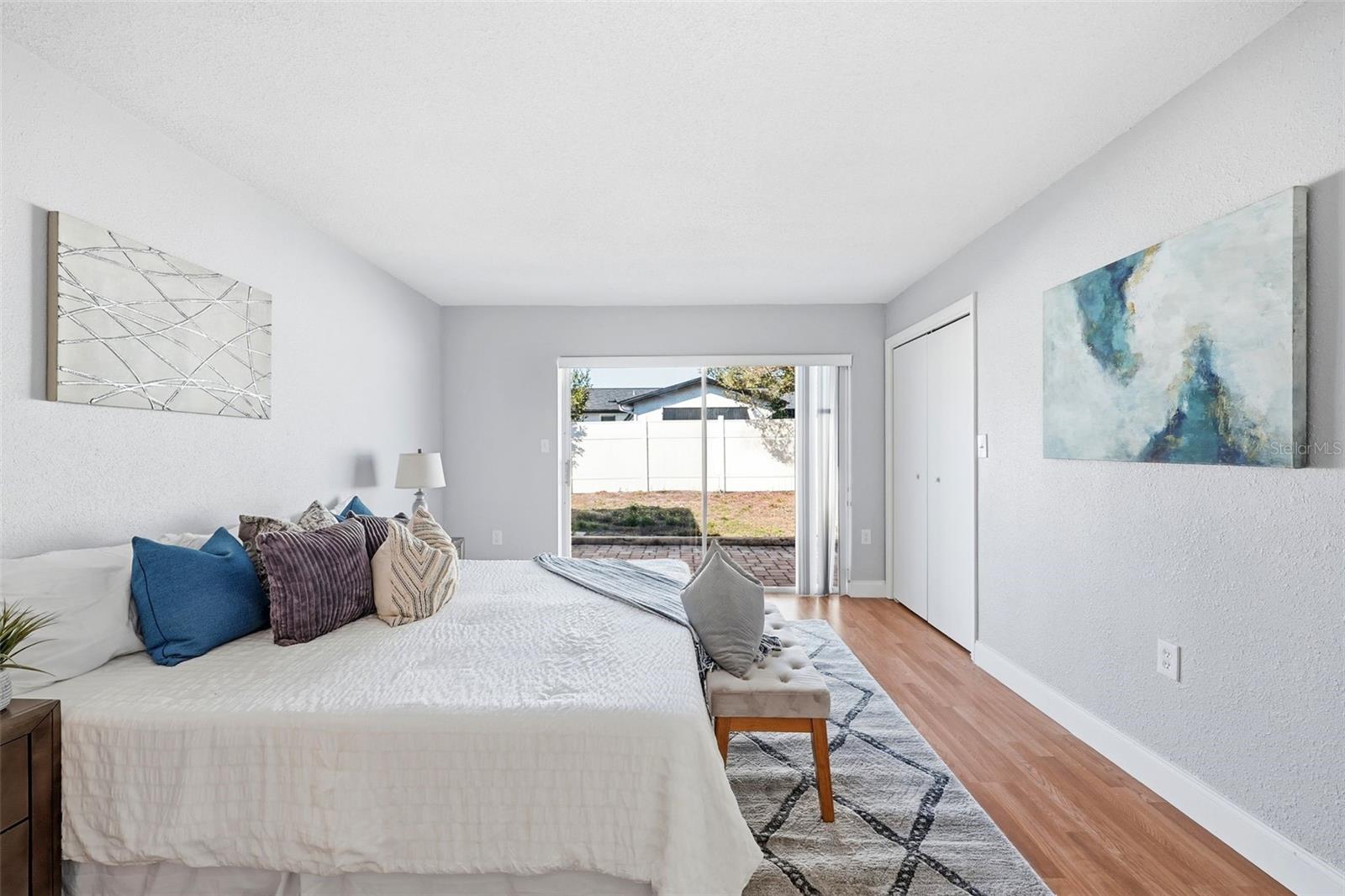 MASTER BEDROOM FACING PRIVATE BACK YARD