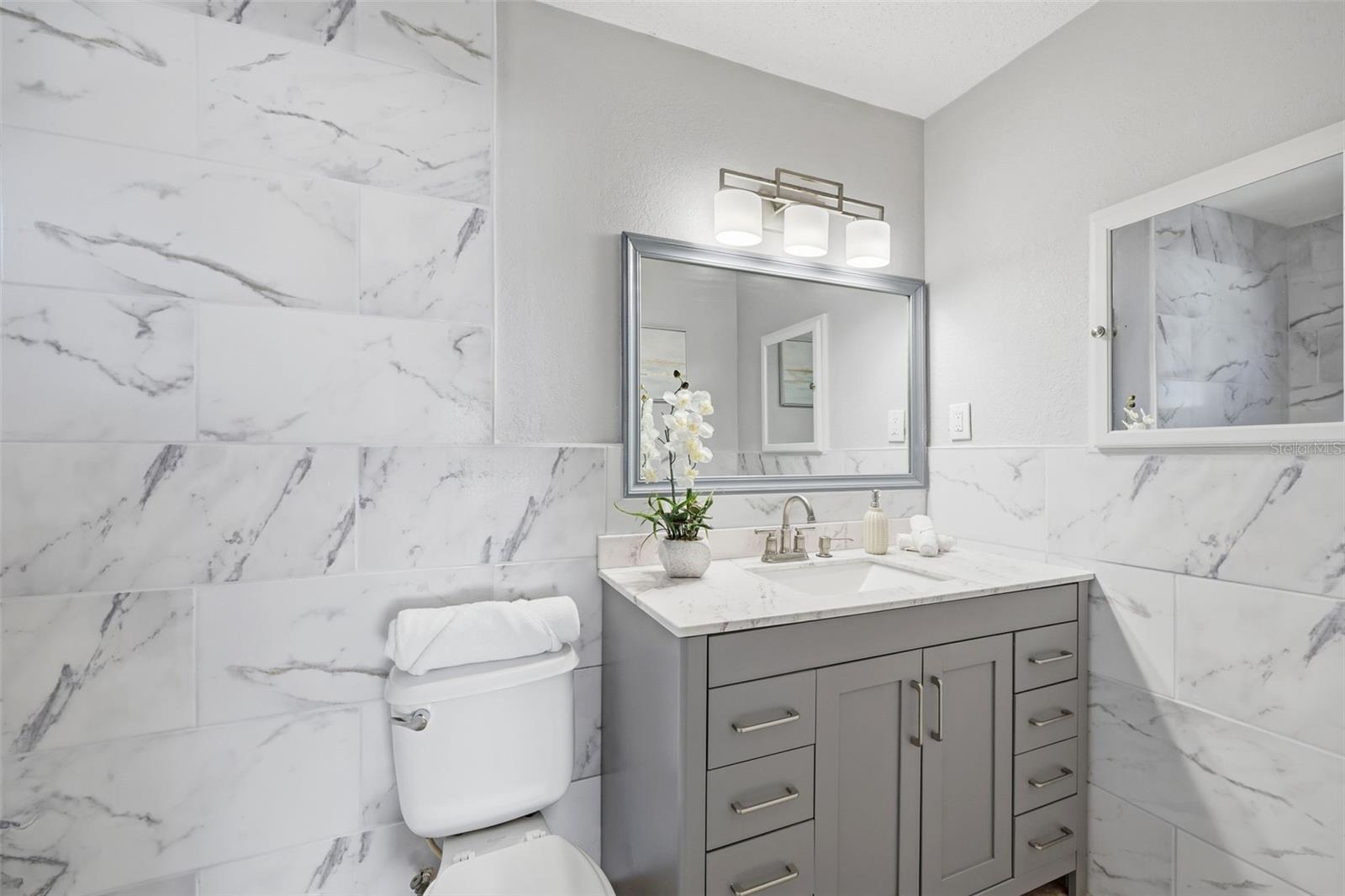 ENSUITE WITH WALK-IN SHOWER AND MODERN FIXTURES