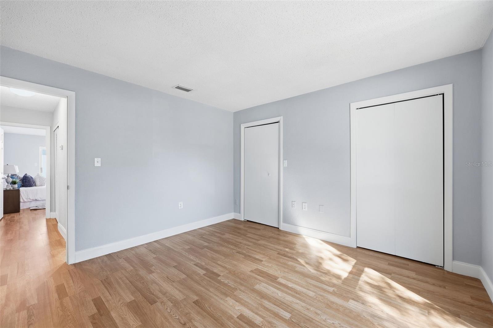 GUEST BEDROOM WITH LARGE CLOSETS
