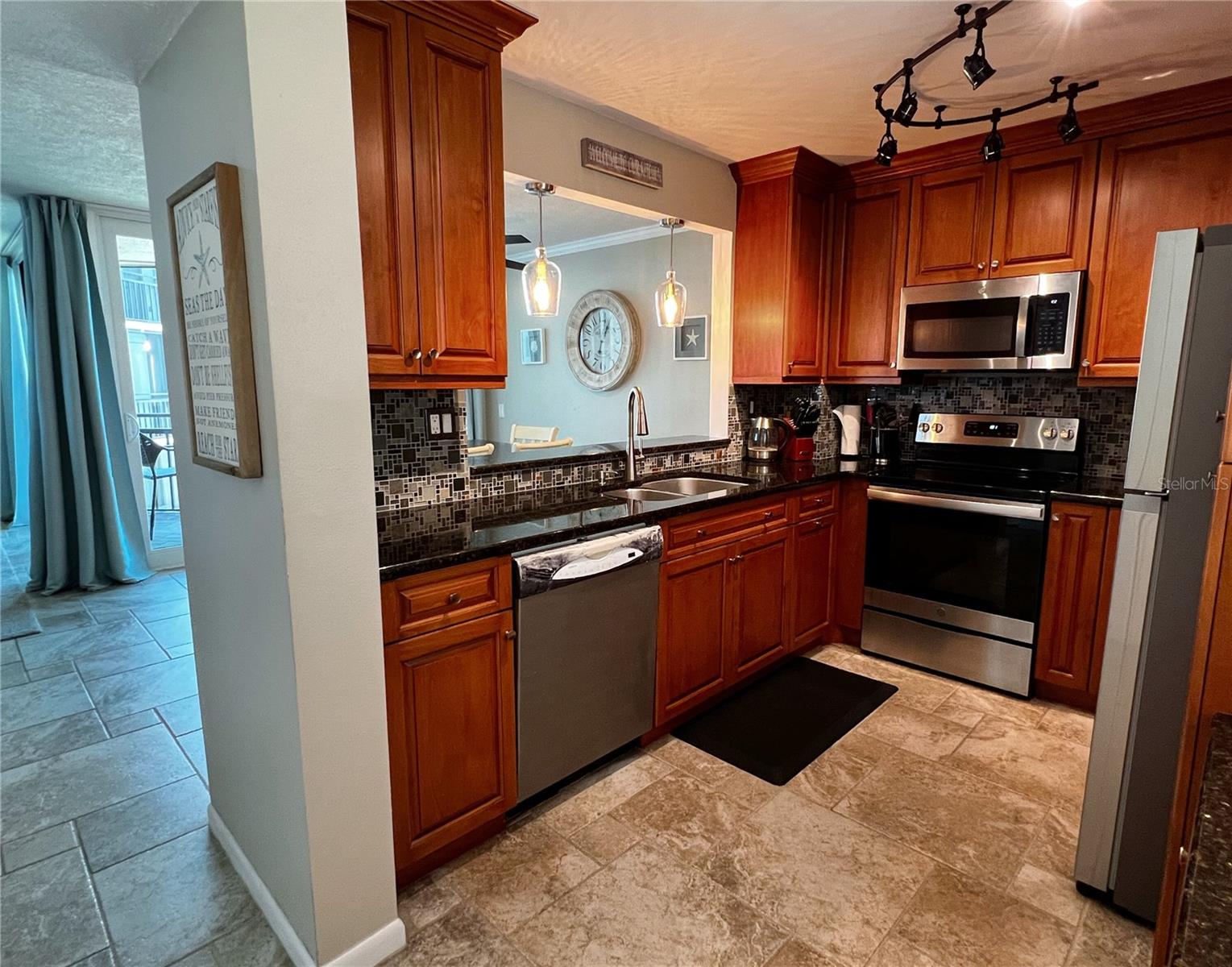 Updated kitchen with newer stainless steel appliances.