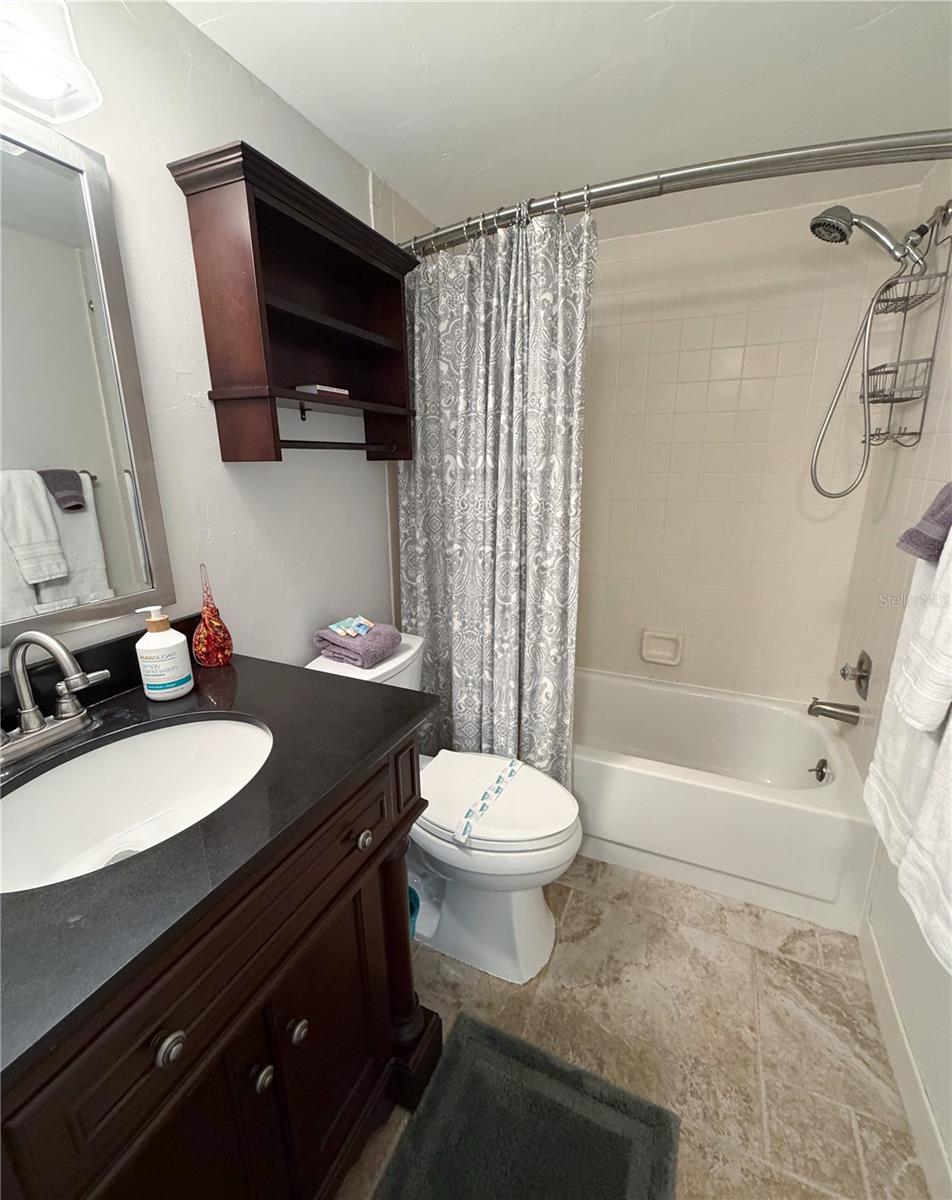Guest bathroom/ bathroom 2 with a tub/shower combo.