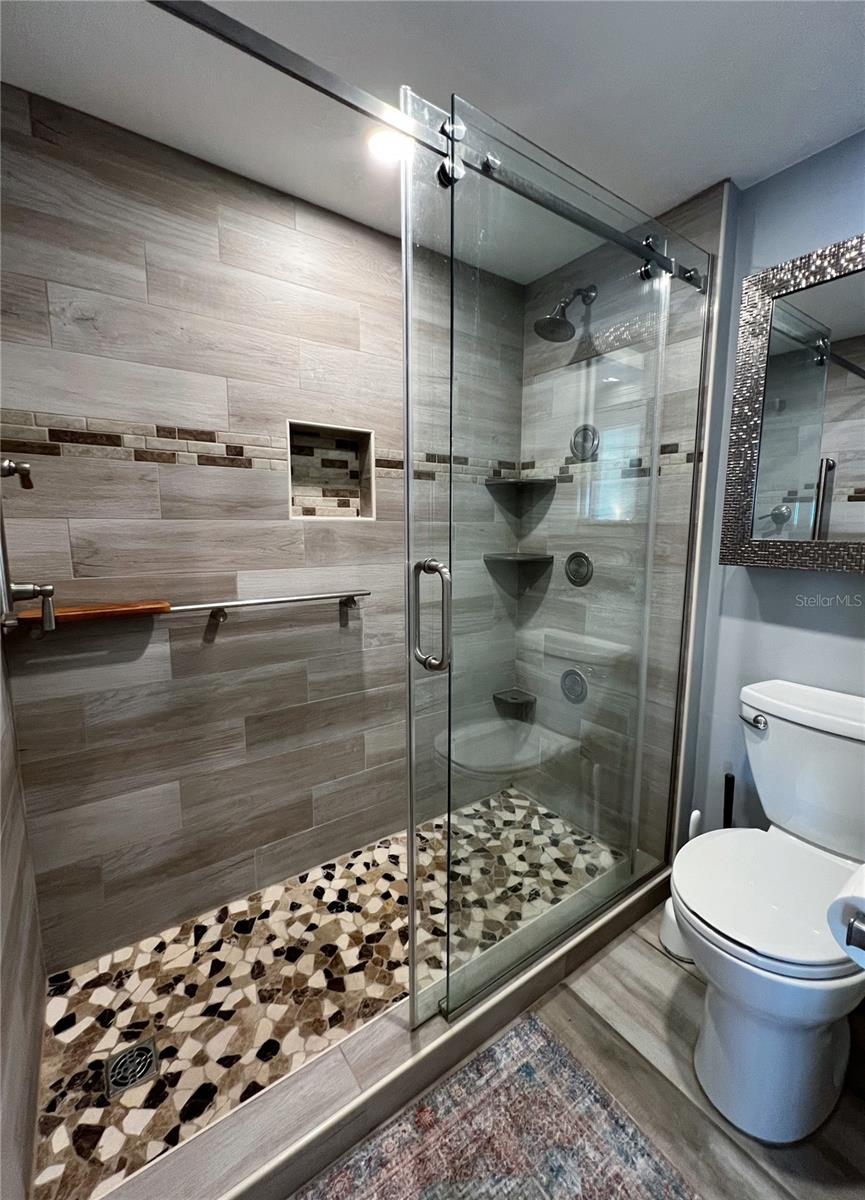 Spa like walk in shower in the primary bathroom.