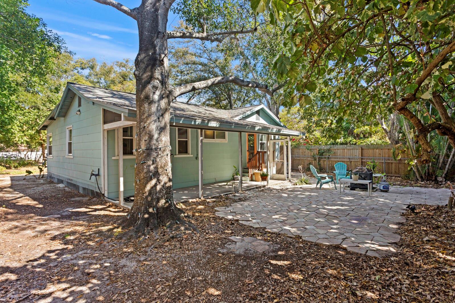 Large backyard with paved patio