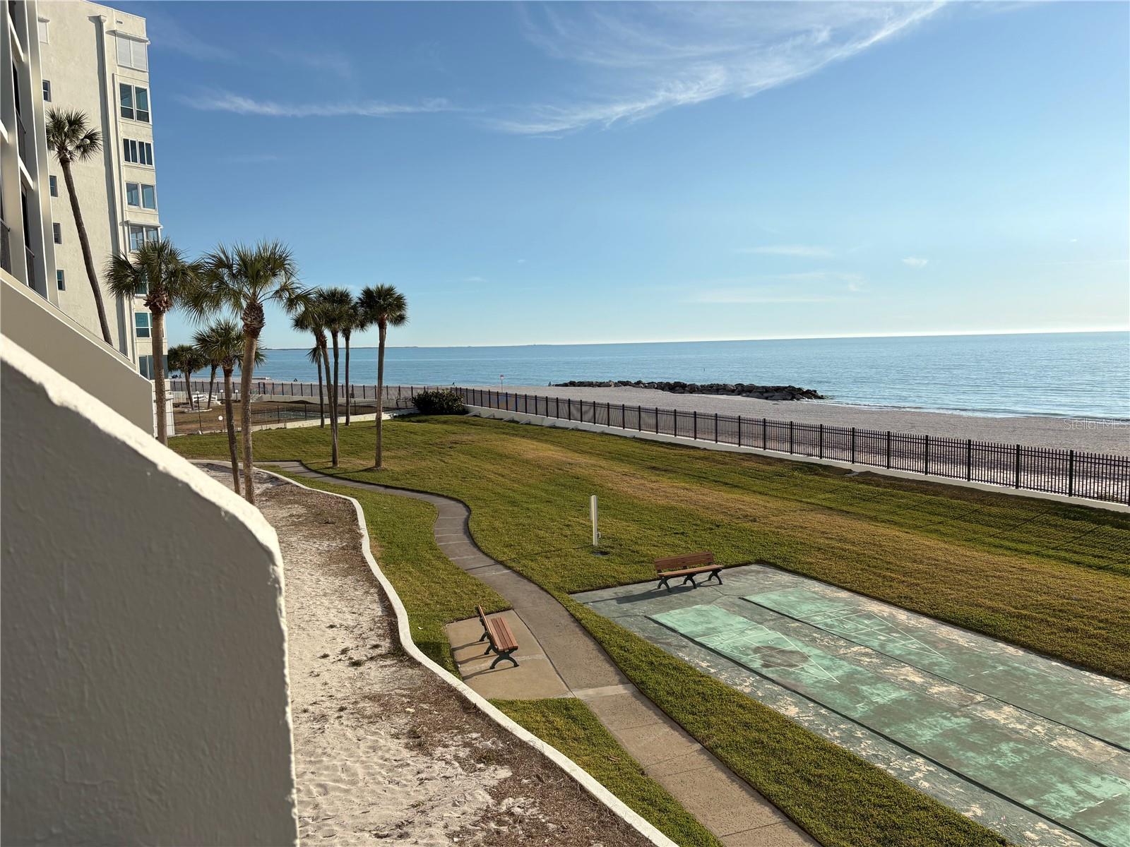 On patio looking south down the beach